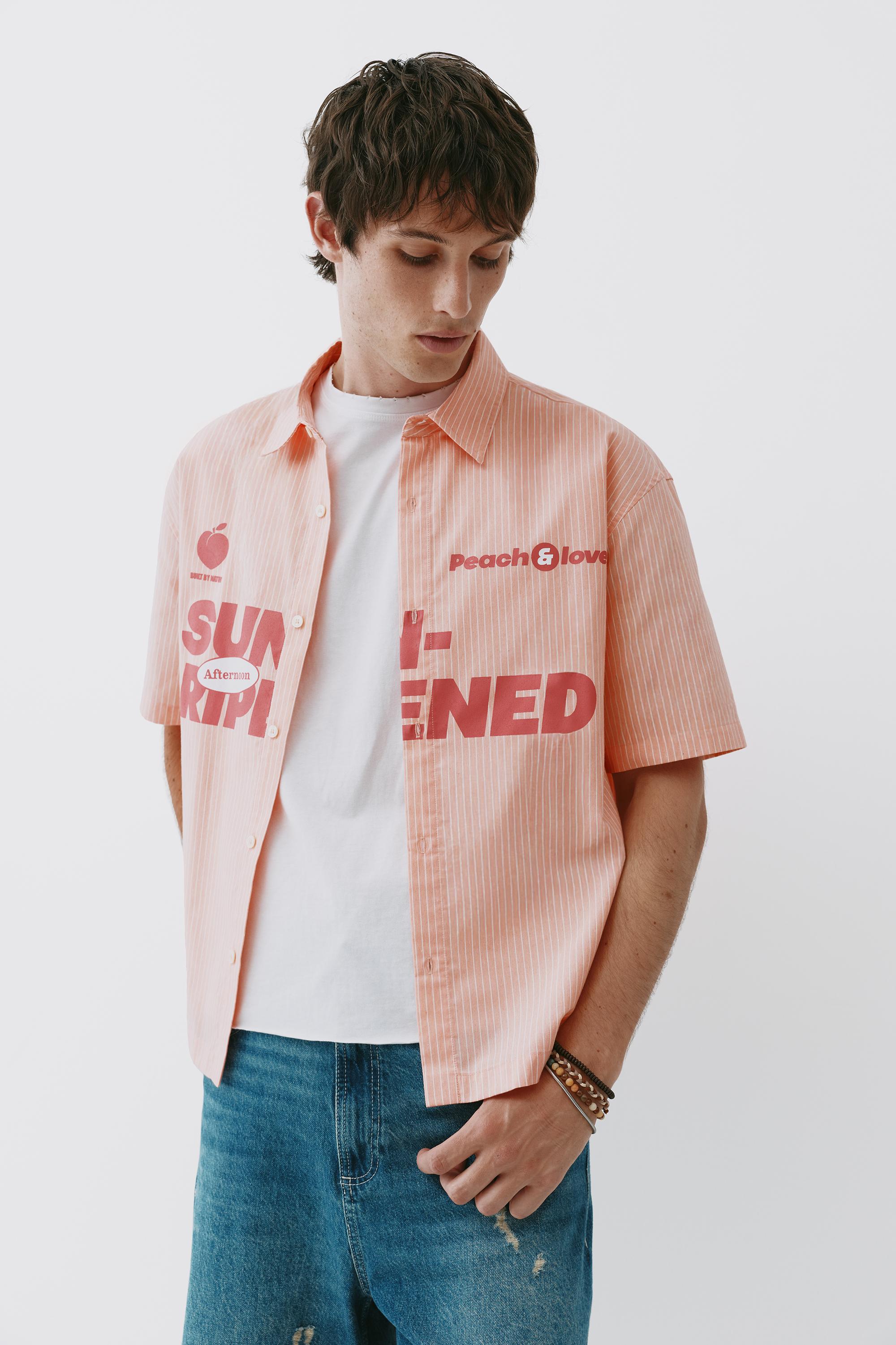 Peach striped graphic shirt — Chalk pink