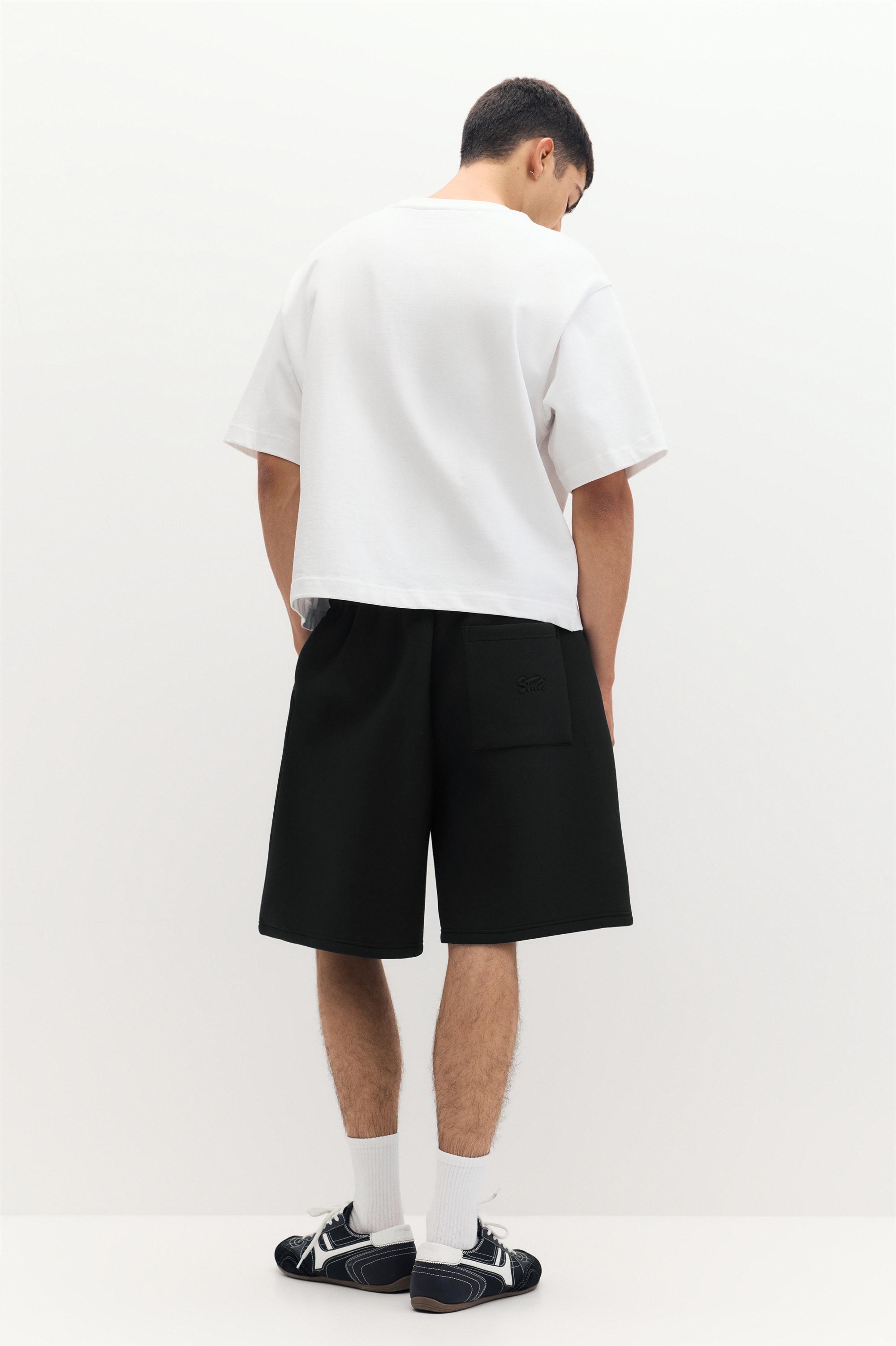 Neoprene-effect jogger Bermuda shorts — Black
