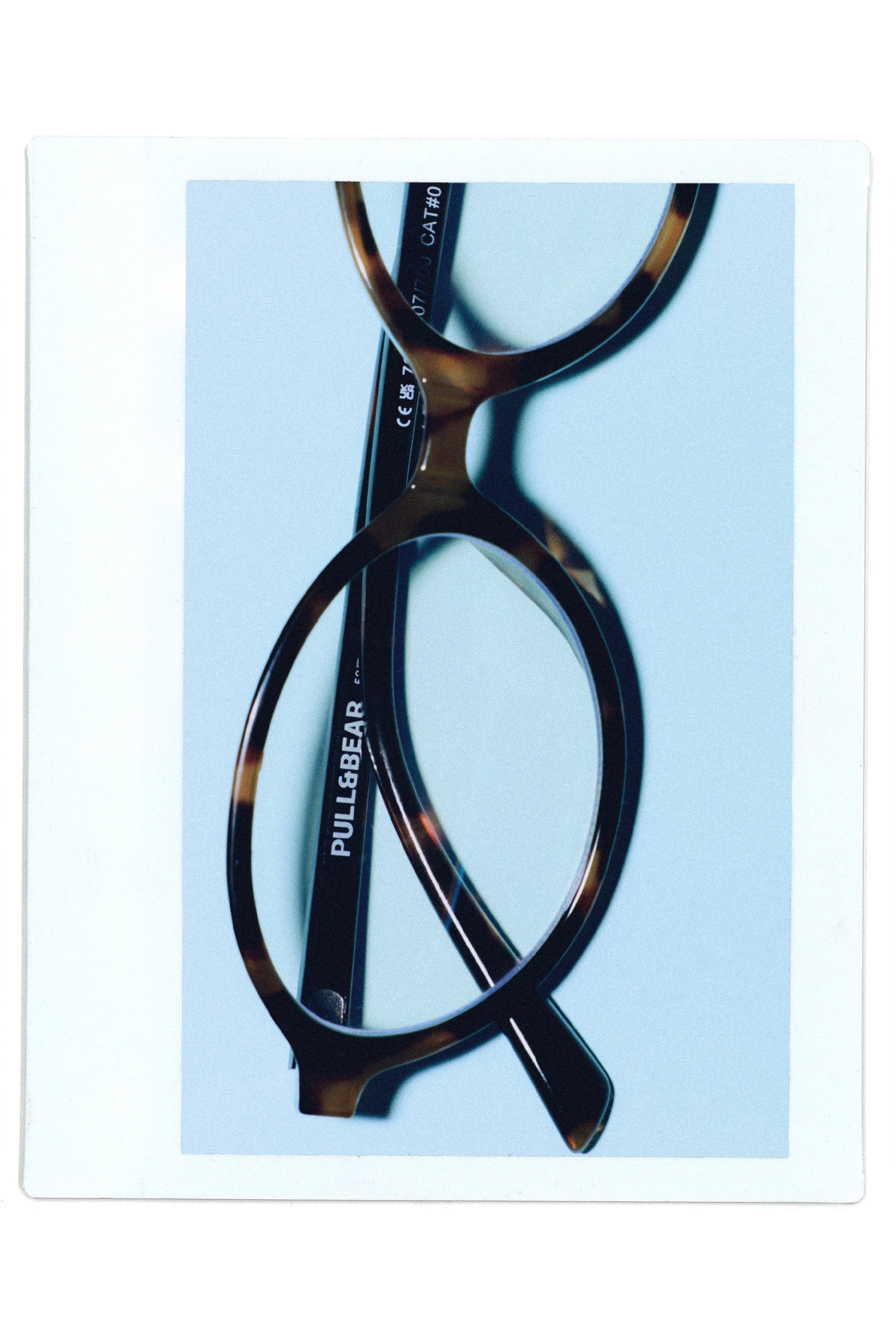 Oval tortoiseshell-effect sunglasses — Brown