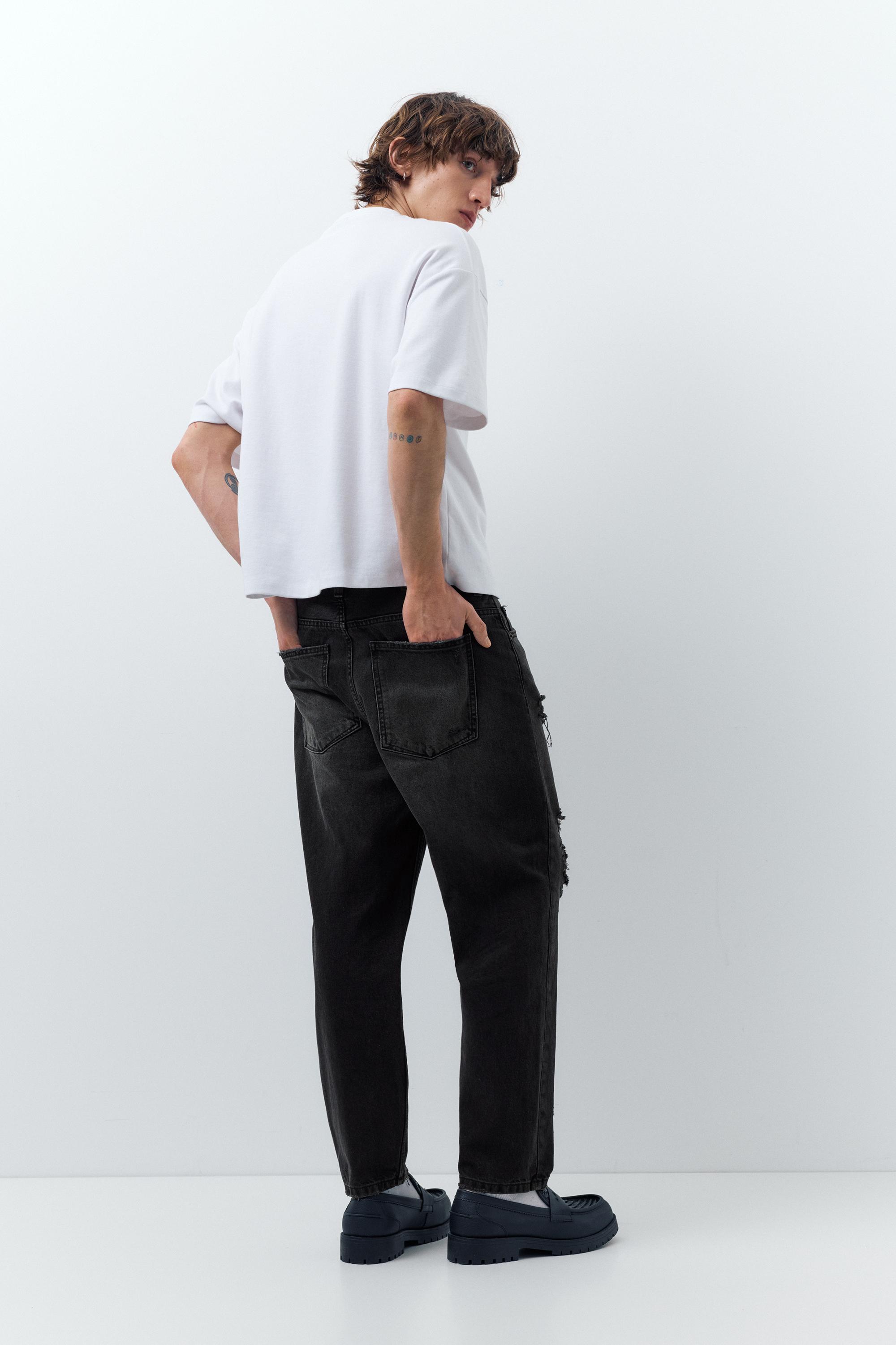 Relaxed fit ripped jeans — Faded black