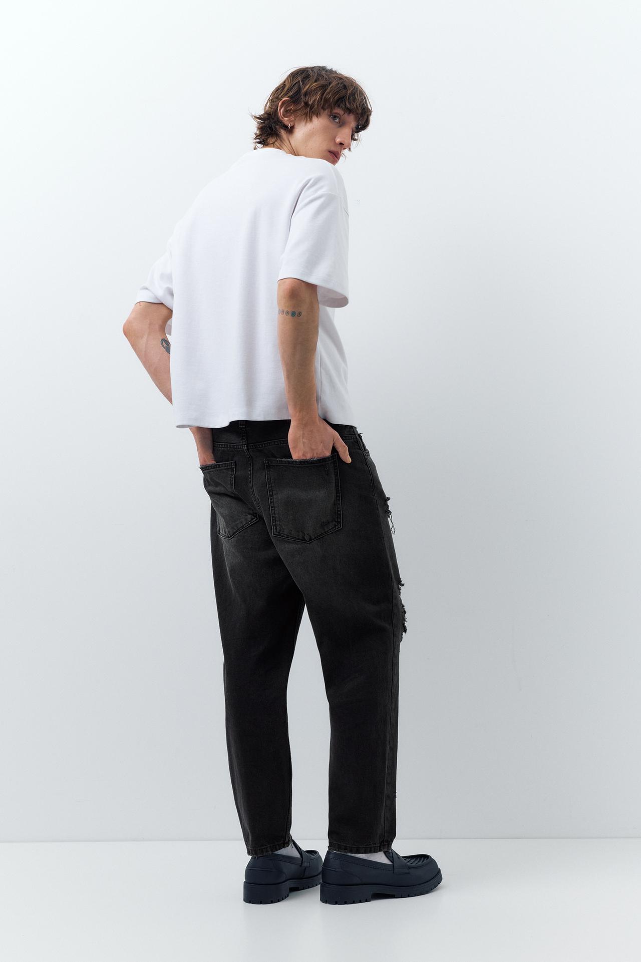 Relaxed fit ripped jeans — Faded black