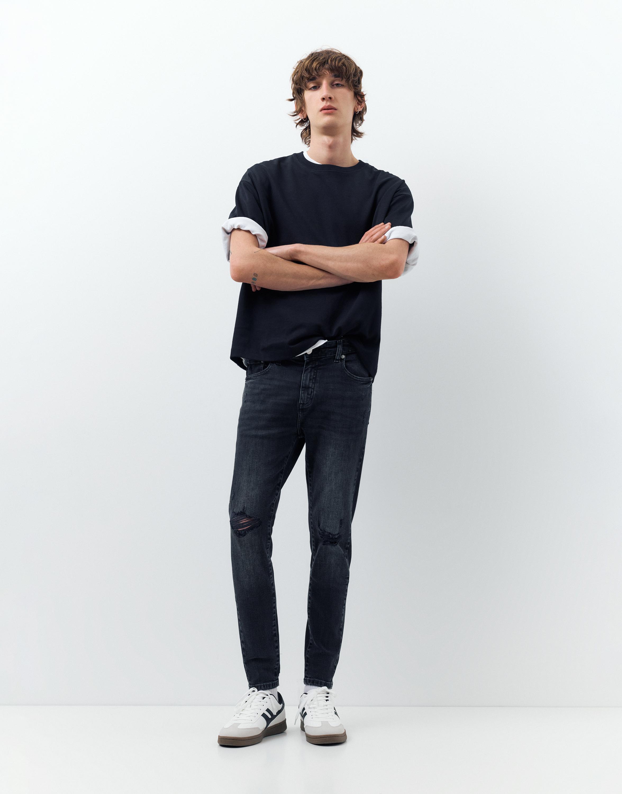 Ripped skinny jeans — Faded black