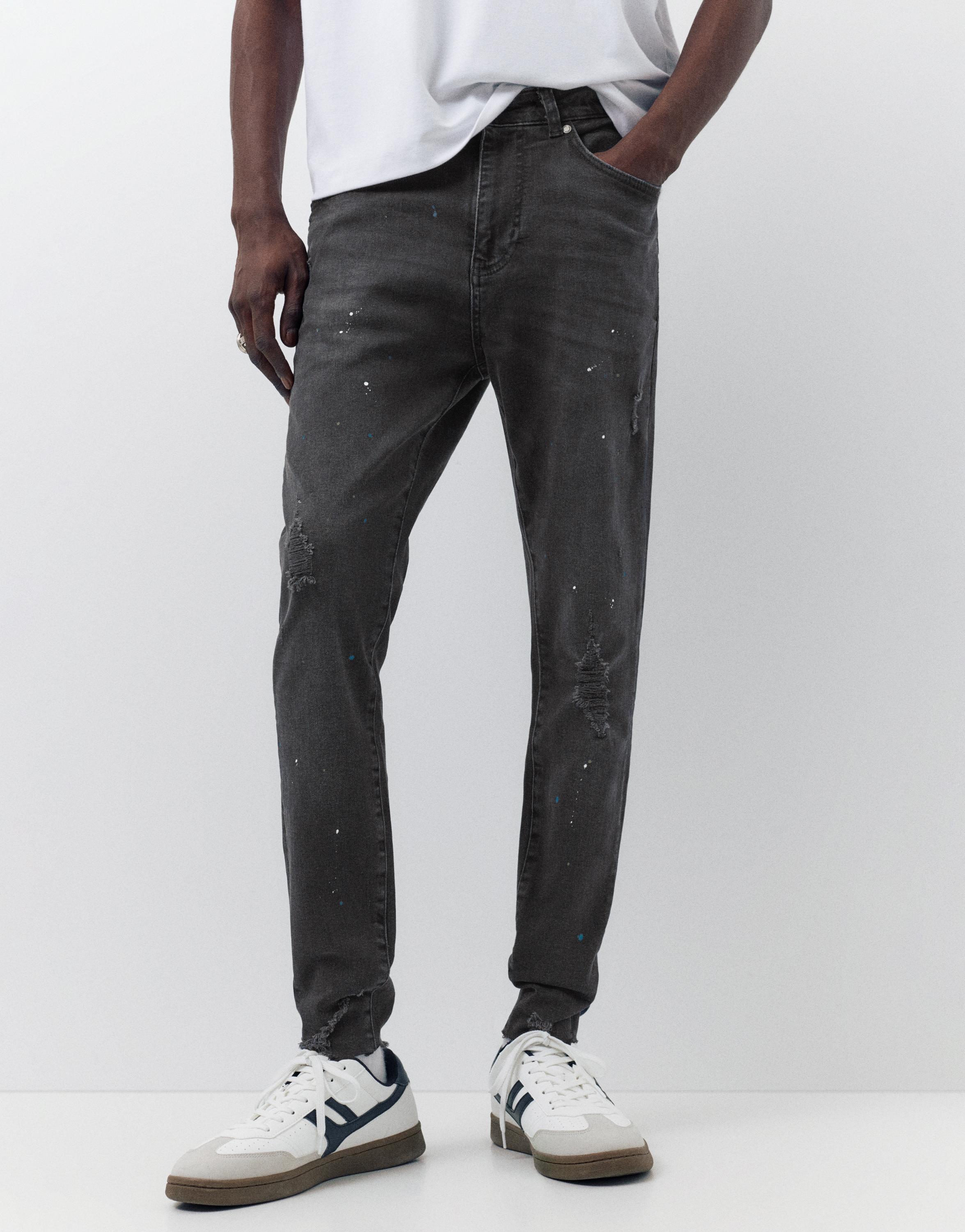 Paint splatter carrot-fit jeans — Faded black