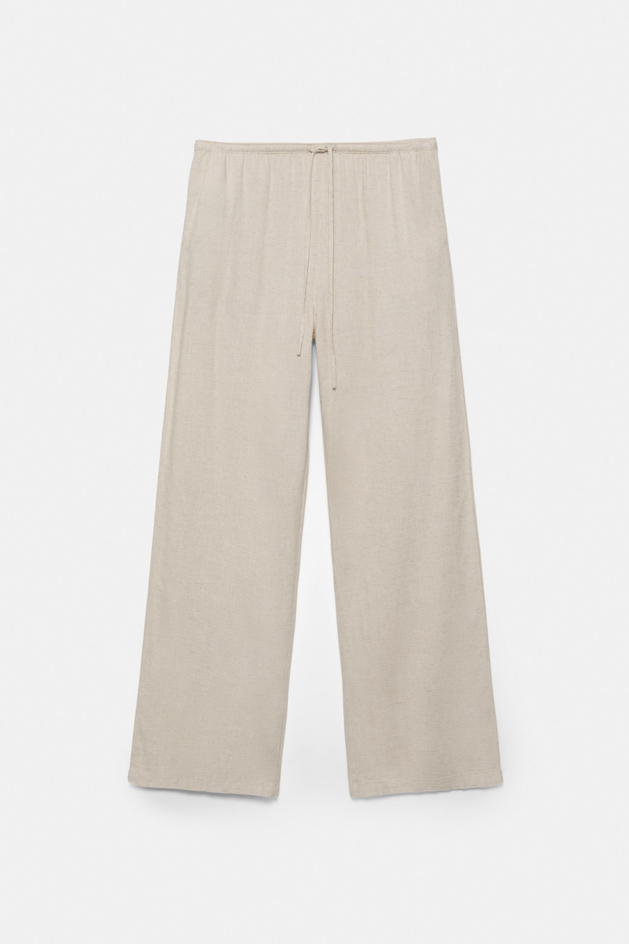Flowy trousers with linen — Beige