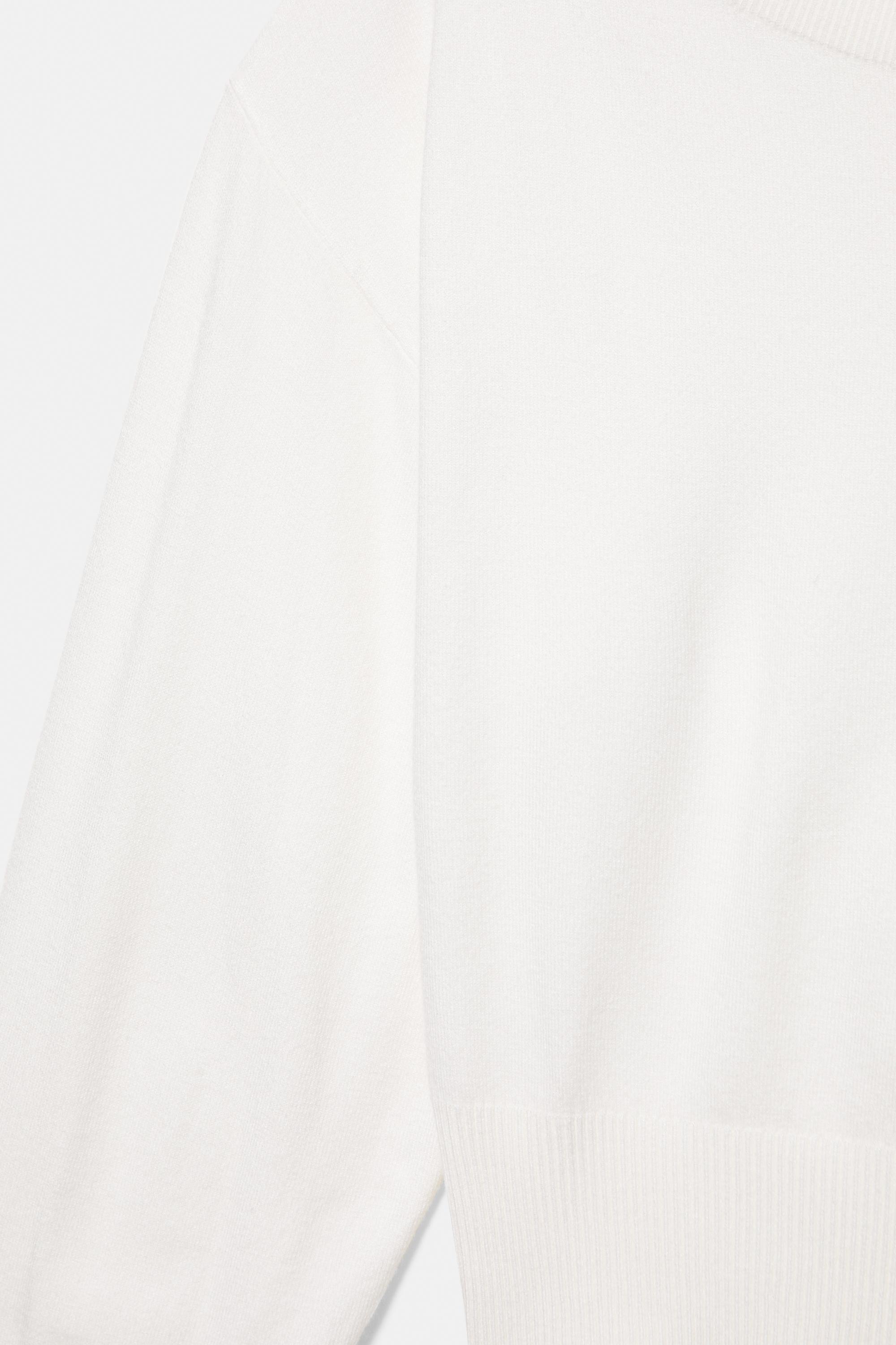 Asymmetric neck jumper — Ecru