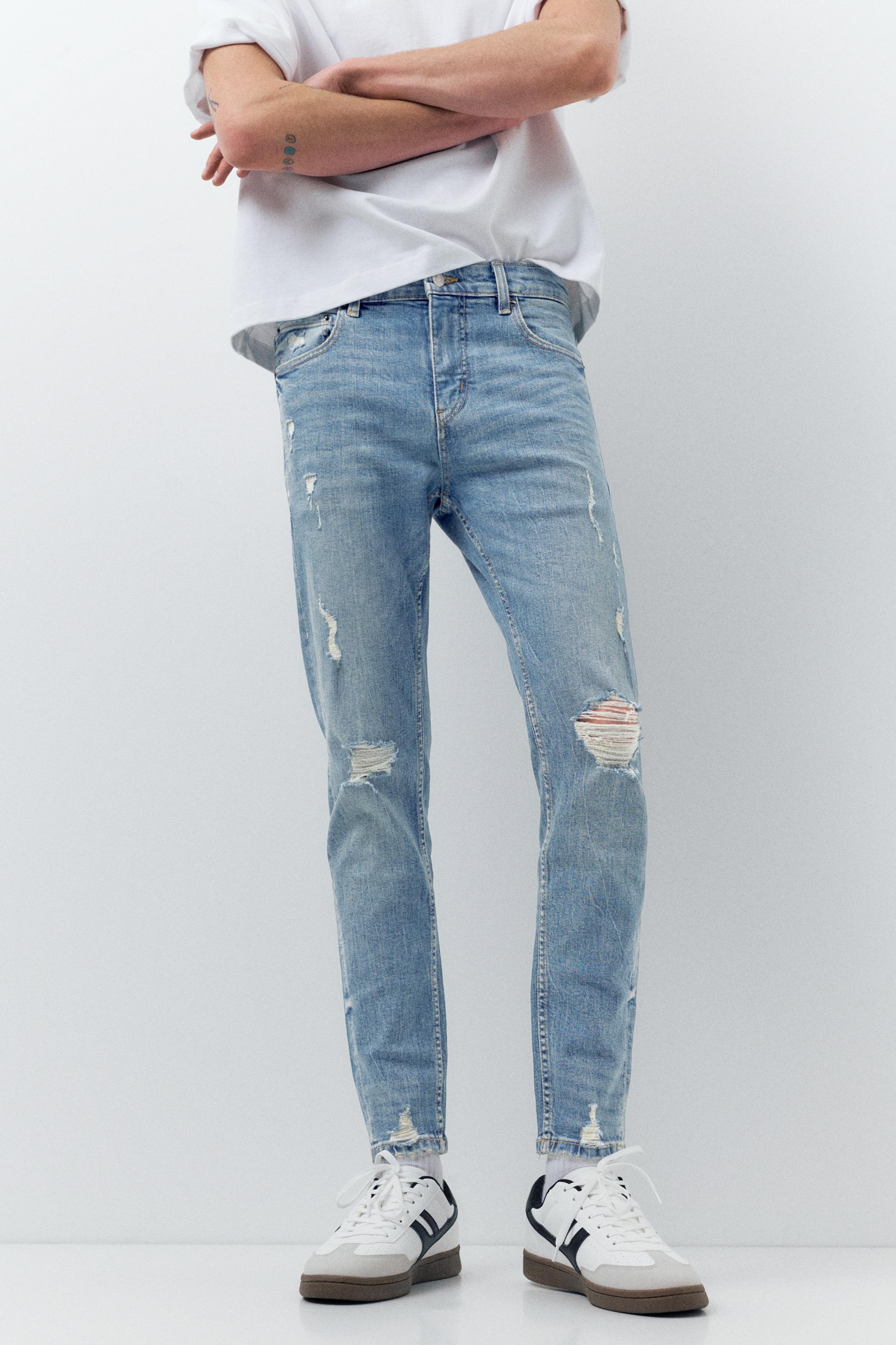 Ripped skinny jeans — Medium blue