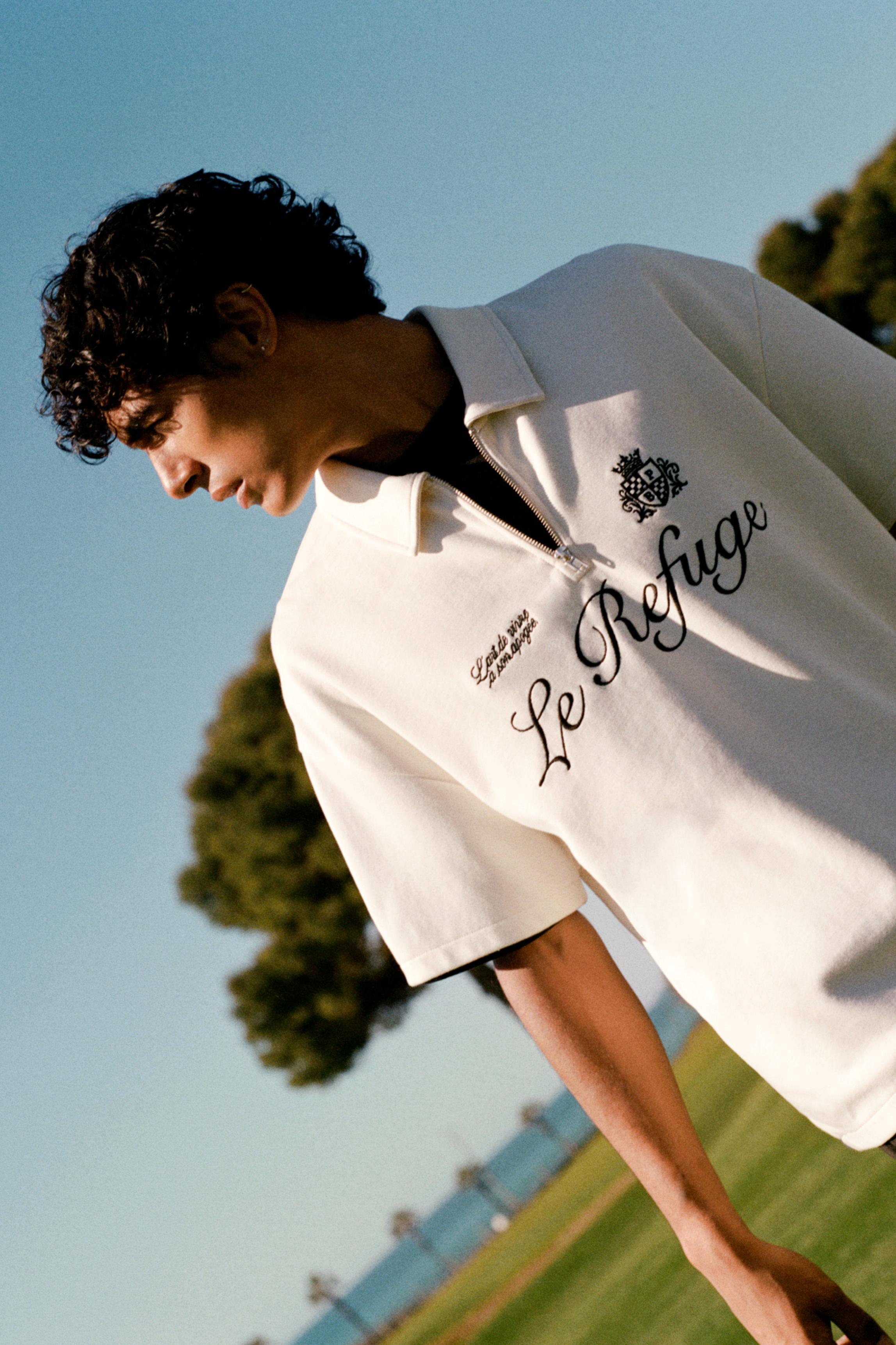 Polo Interlock Con Zip E Grafica