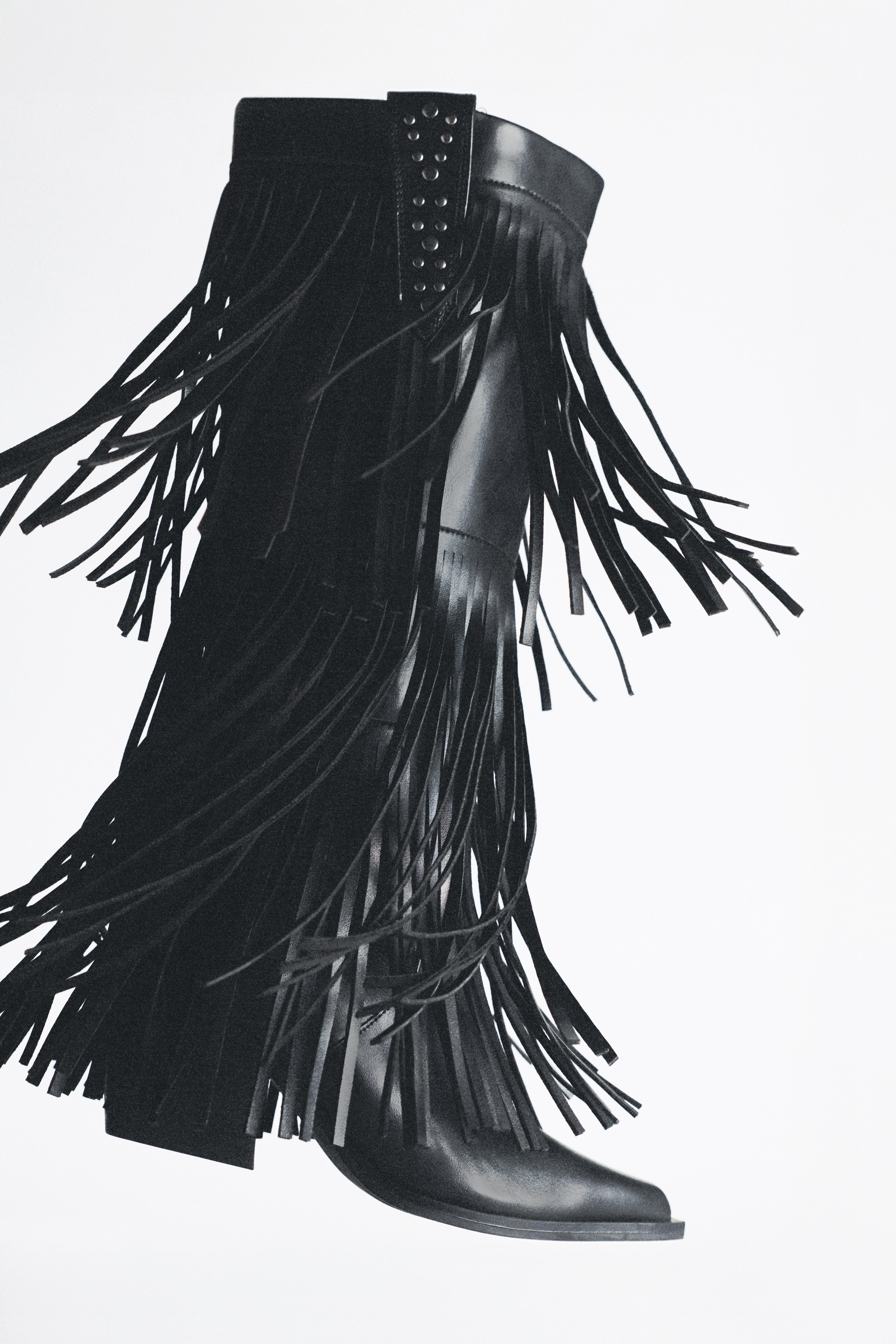 Fringed cowboy boots — Black