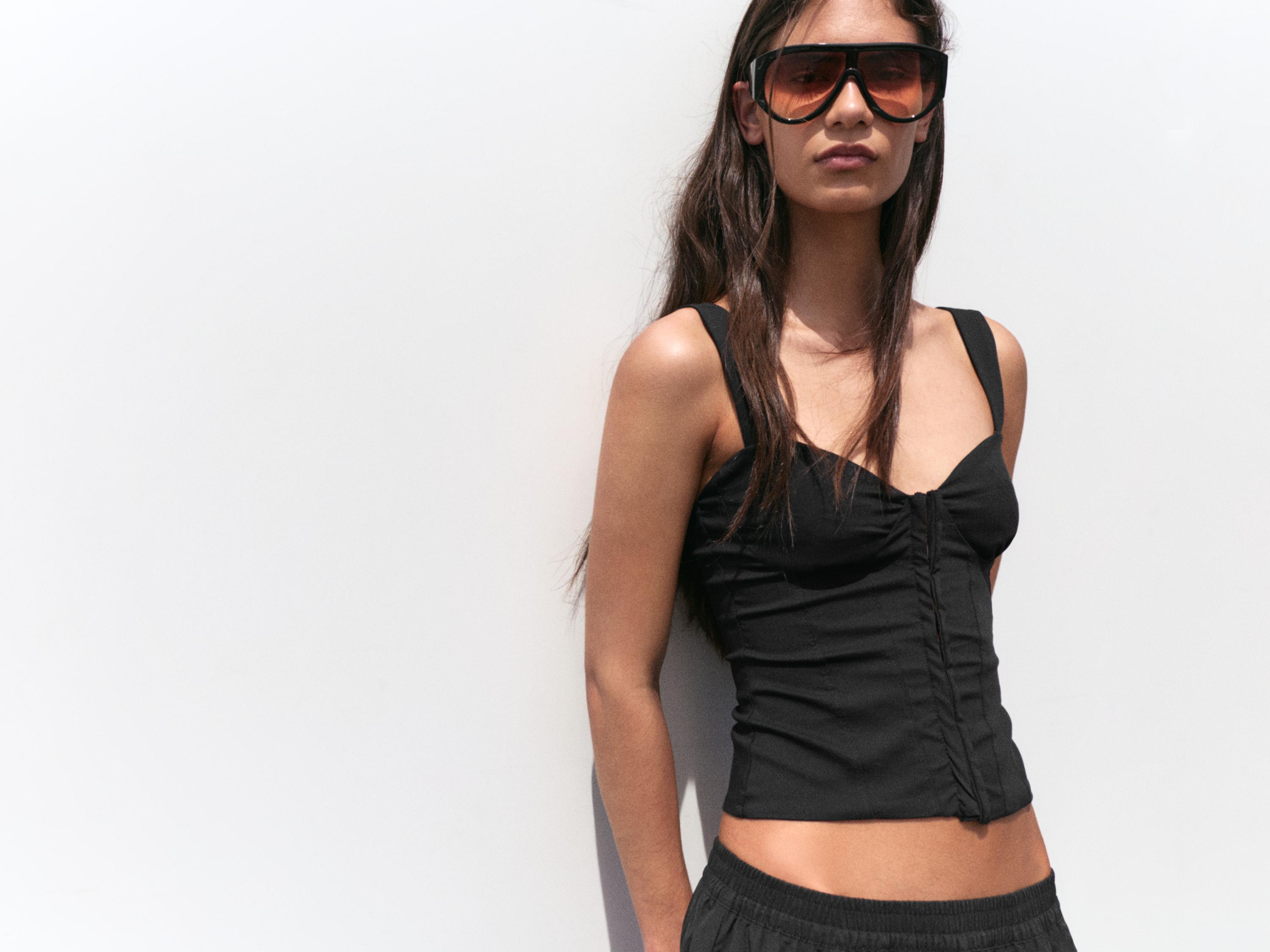 Strappy corsetry-inspired top — Black