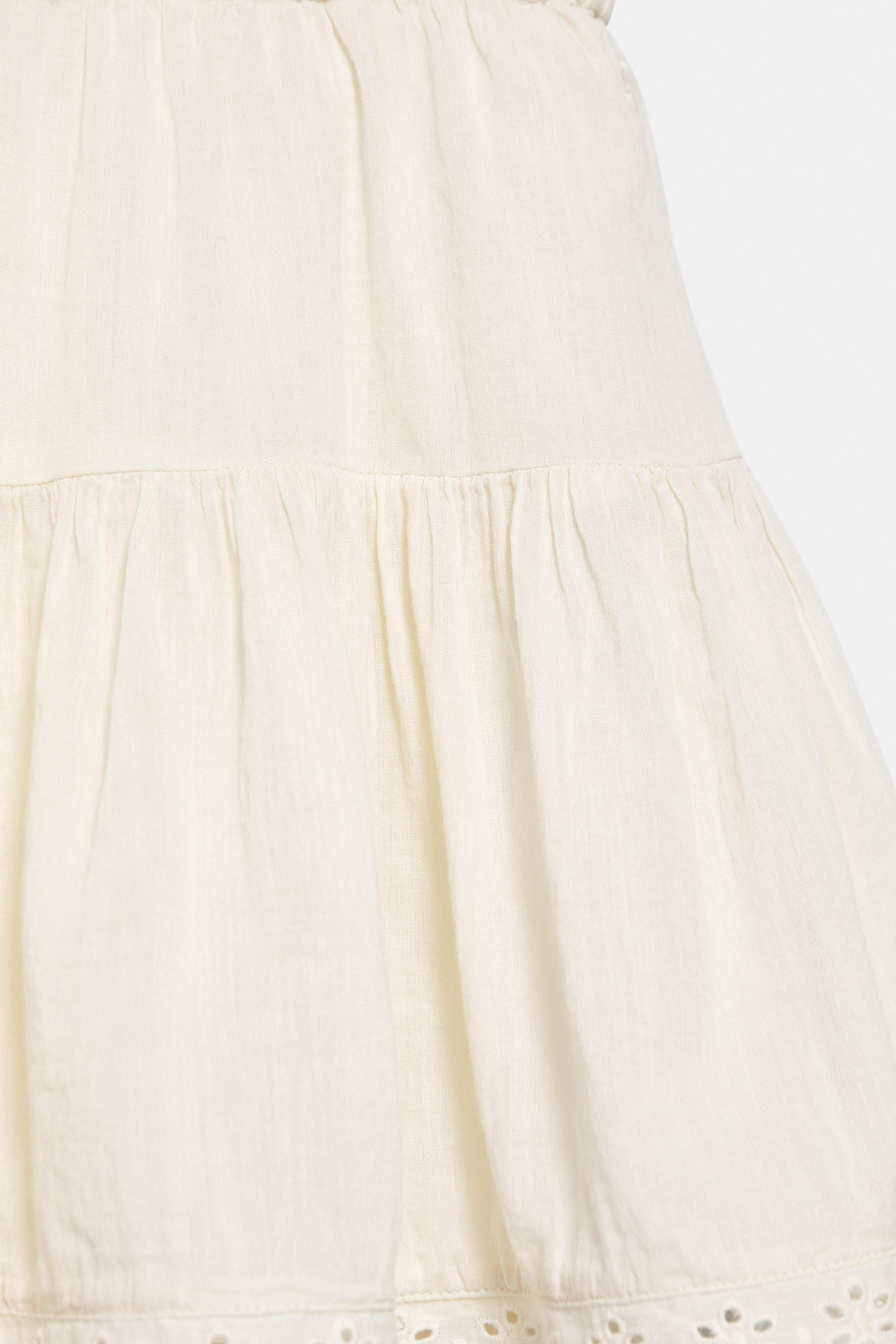 Ruffled mini skirt with lace trim