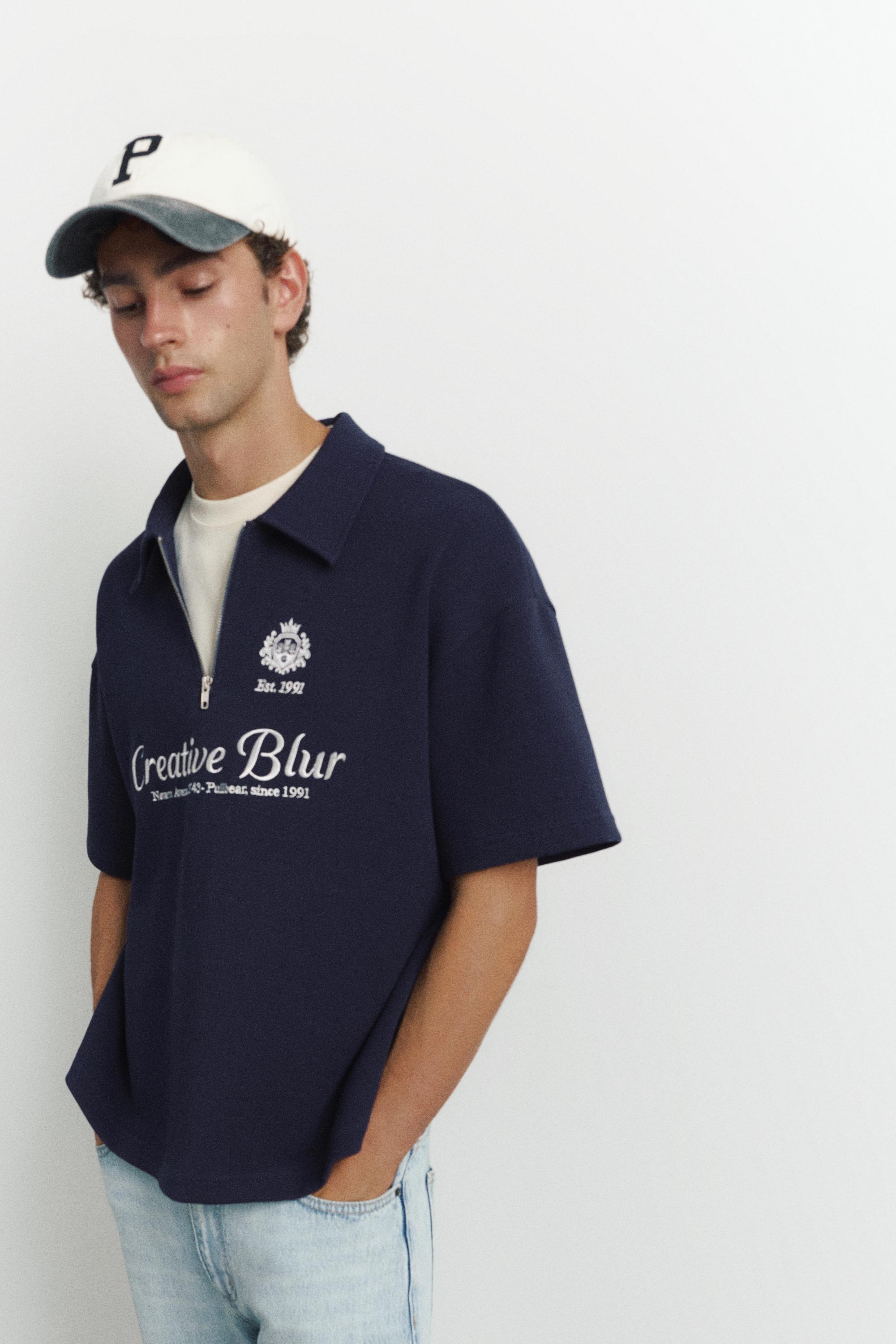 Interlock graphic polo shirt with zip — Navy