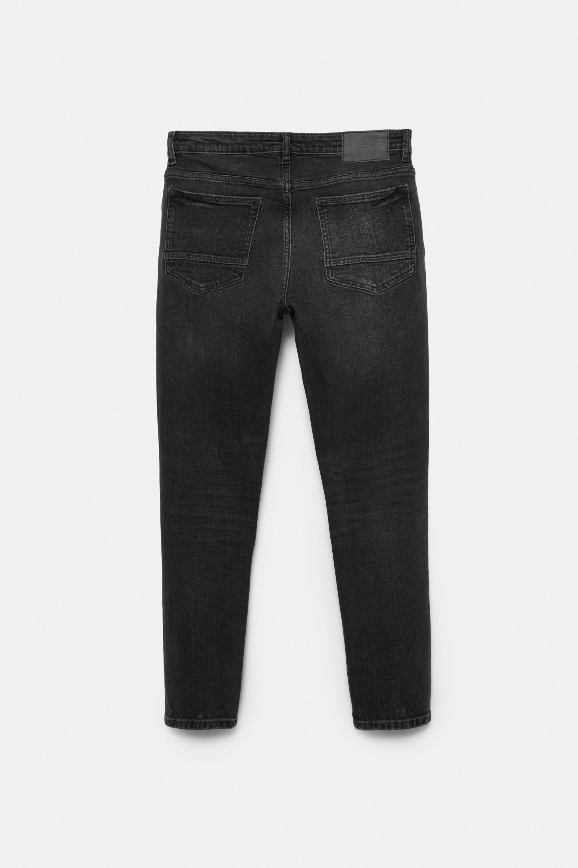 Ripped skinny jeans — Faded black