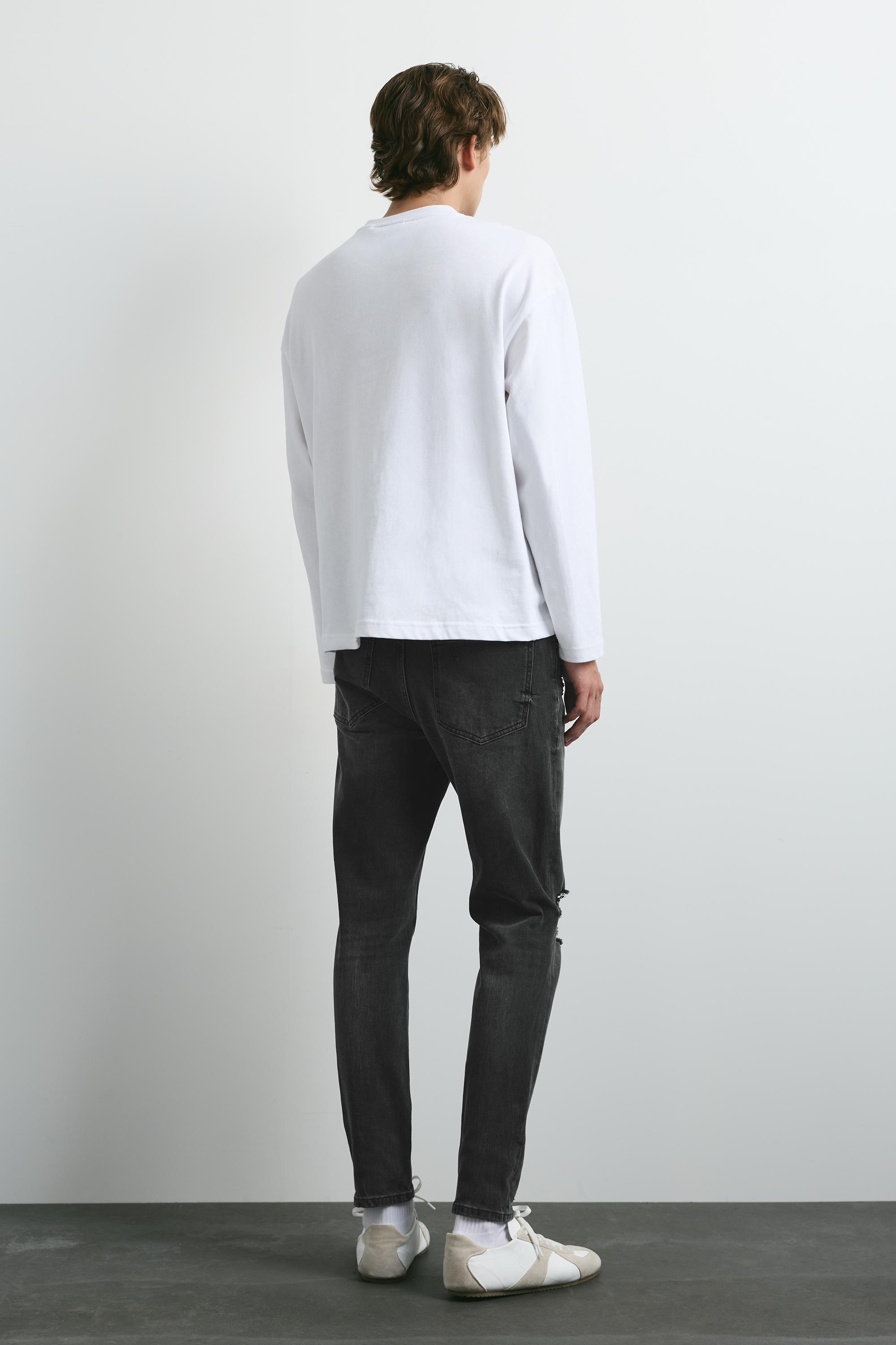 Ripped skinny jeans — Faded black
