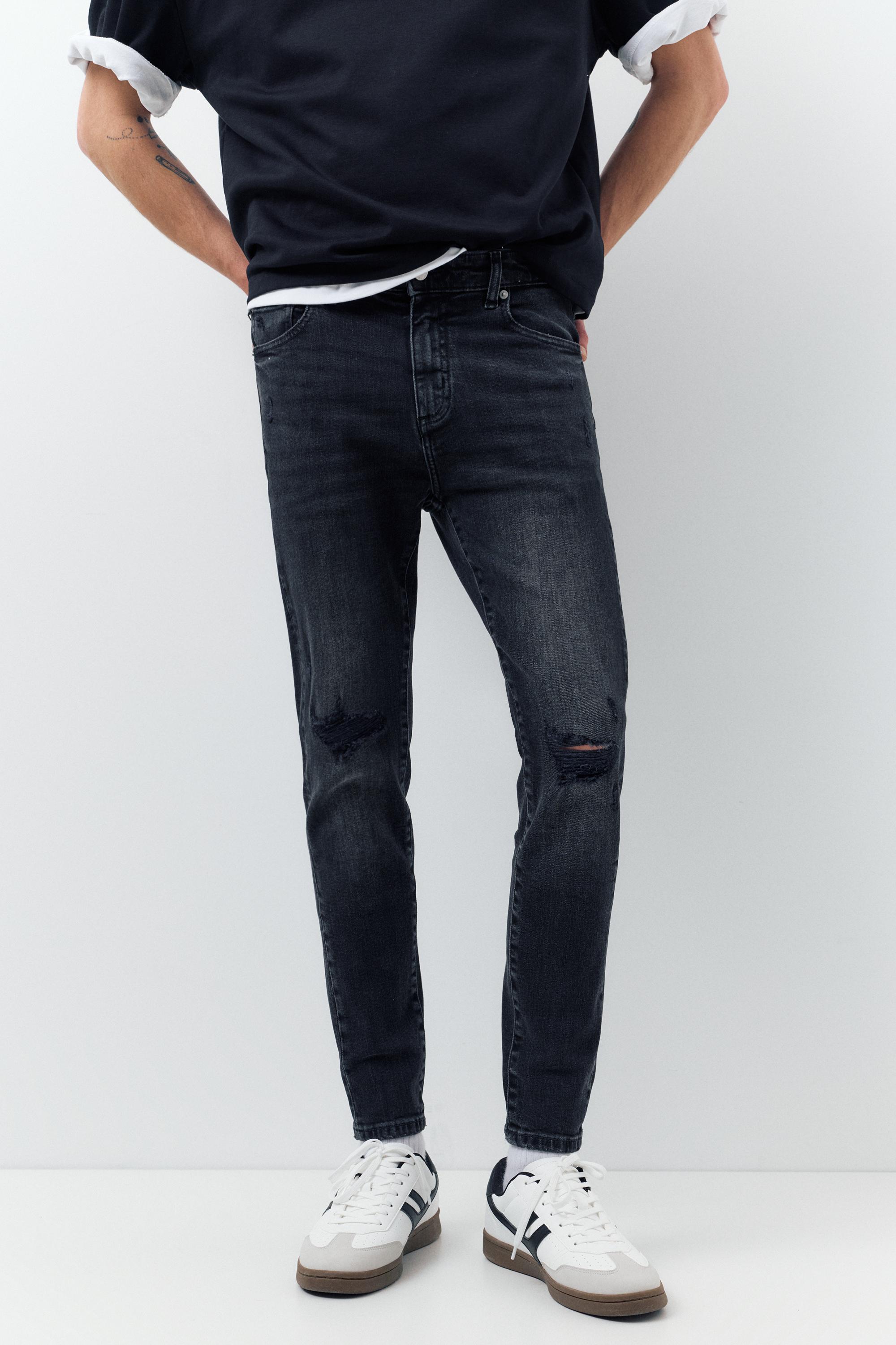 Ripped skinny jeans — Faded black