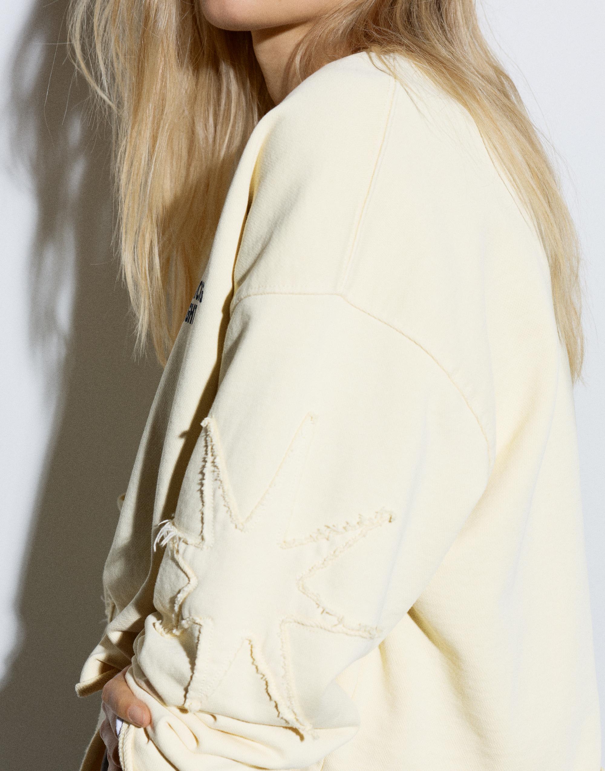 Cropped star graphic sweatshirt — Yellow