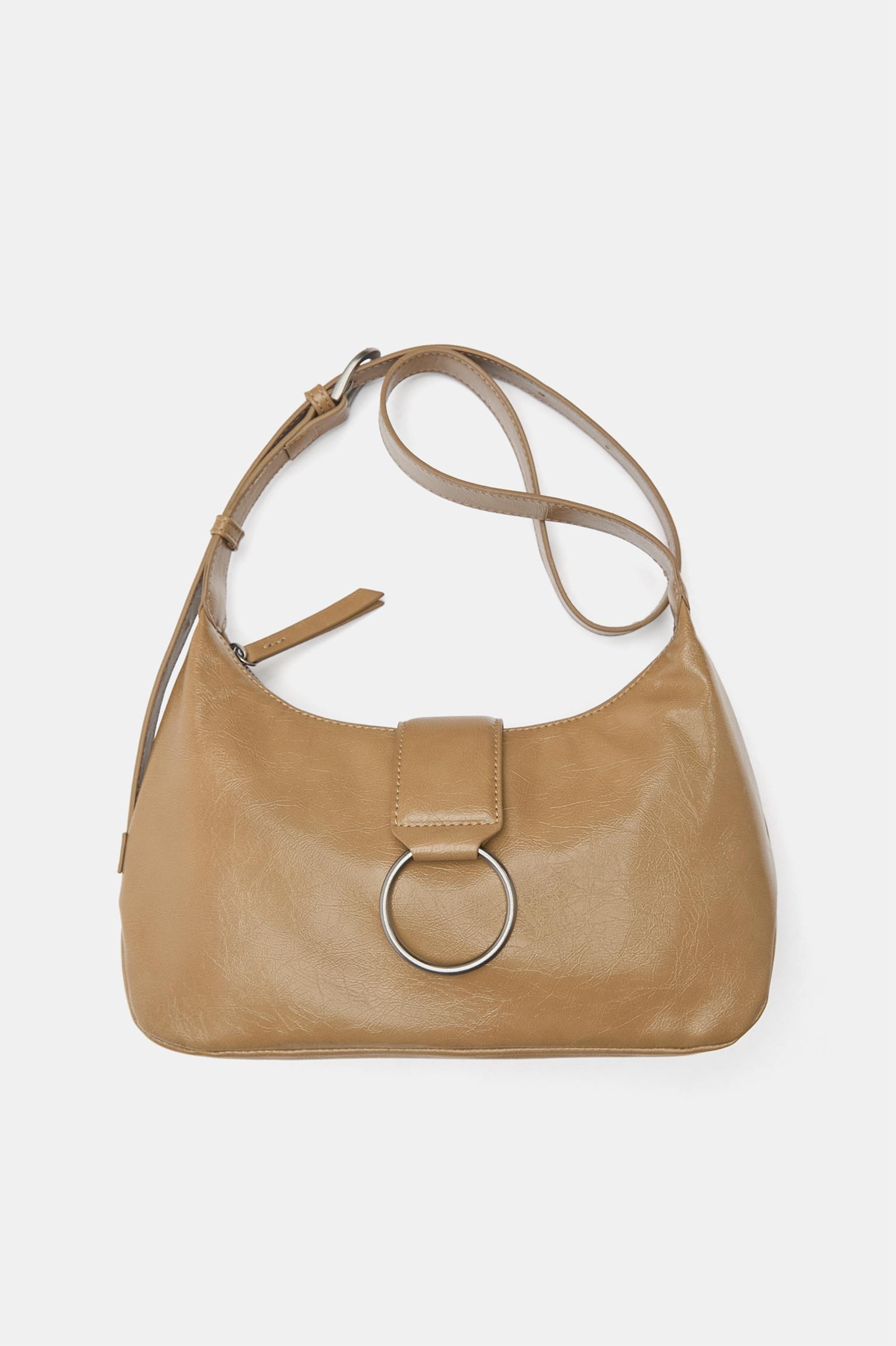 Crossbody bag with buckle — Leather