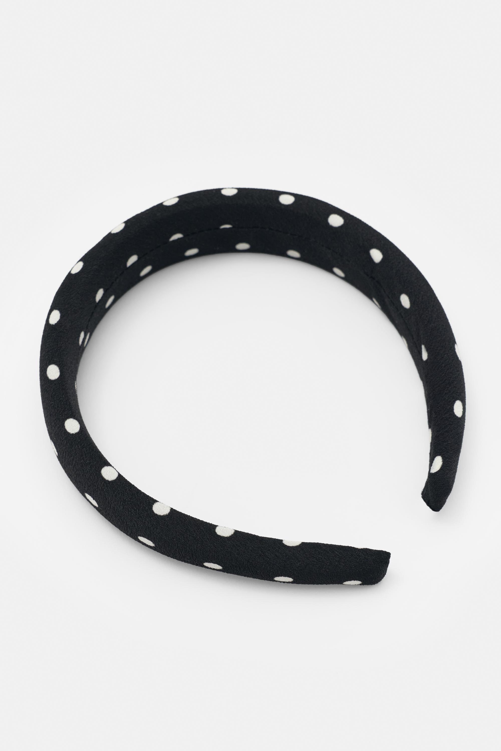 Sert puantiyeli taç