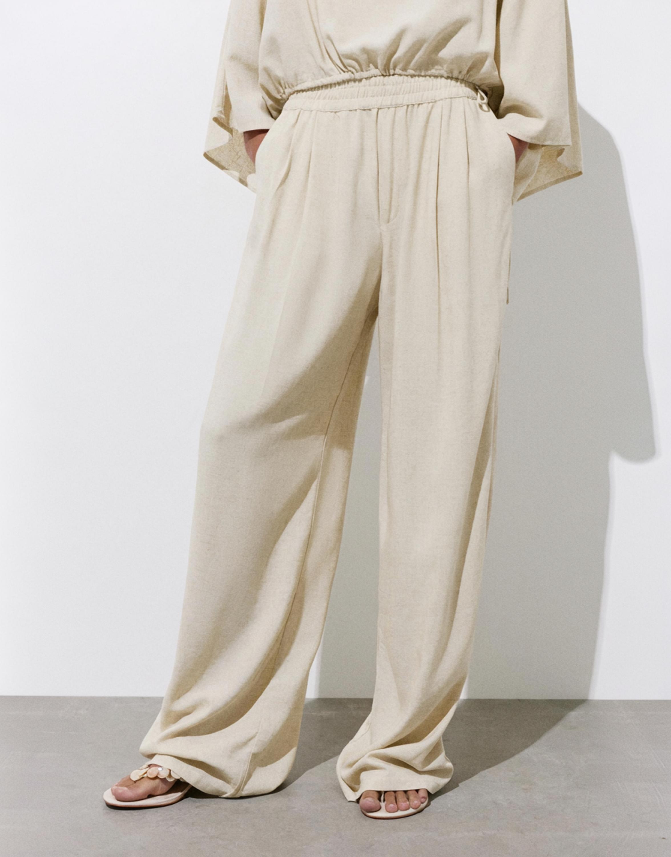 Flowing darted trousers — Sand