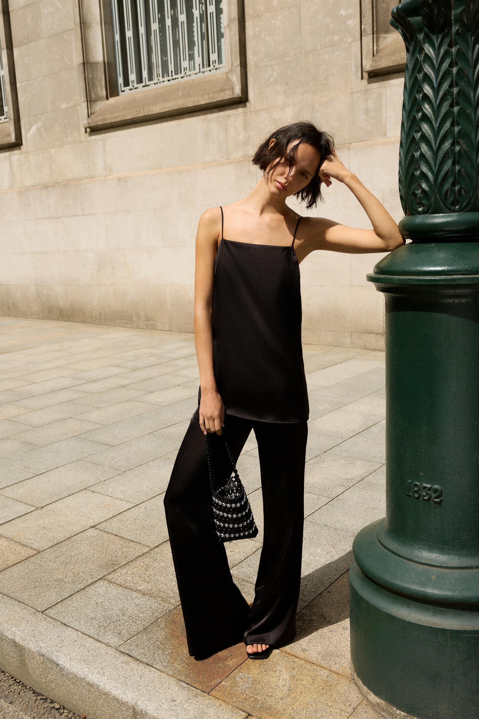 Striped beaded handbag — Black