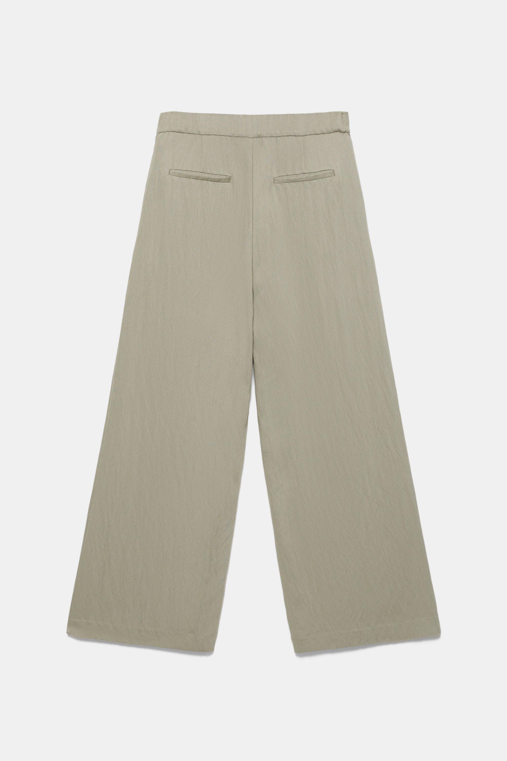 Düğmeli ve fermuarlı, kemer tokalı, önü pensli, elastik belli, tailored fit pantolon. - Görsel 30