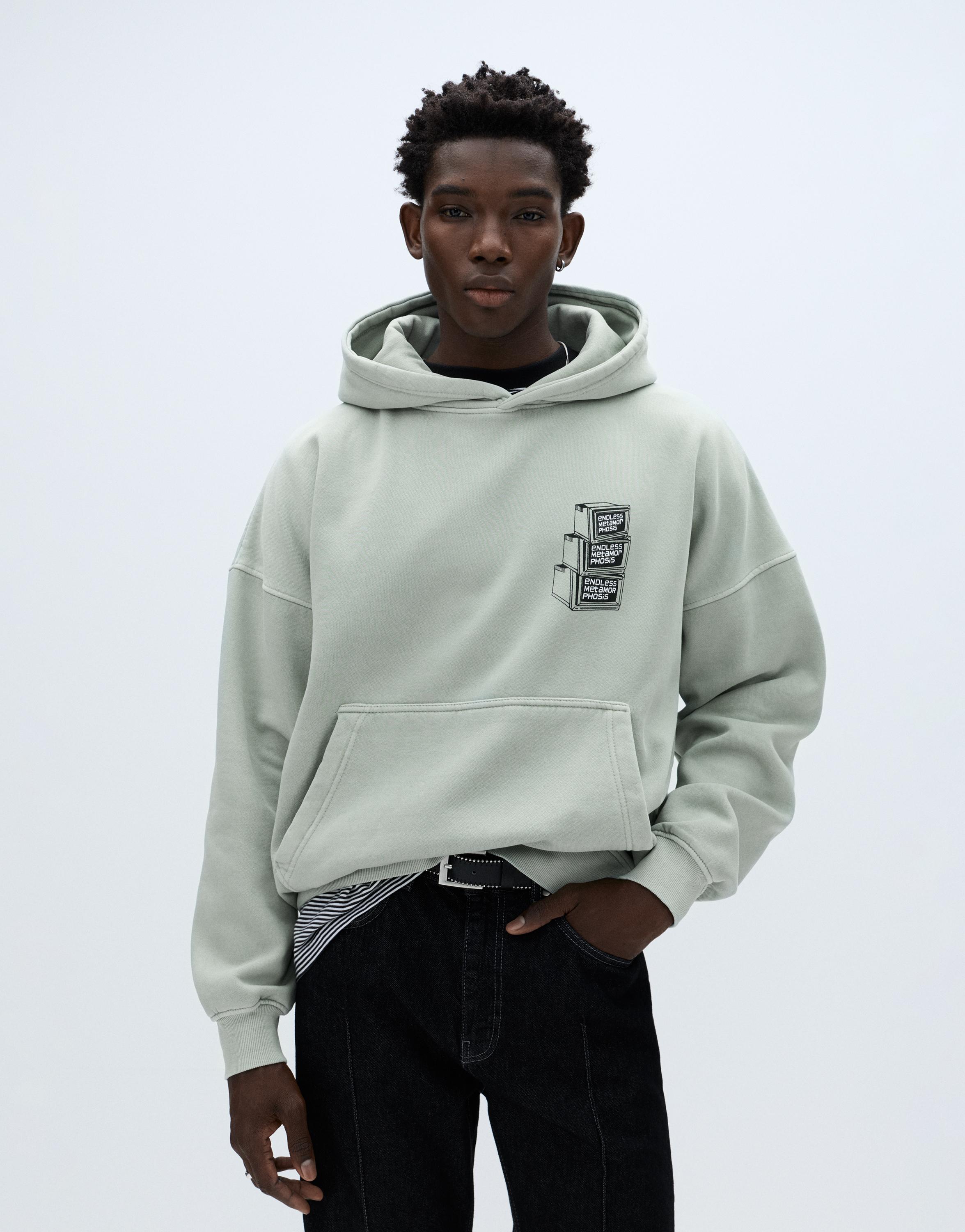 Oversize kapüşonlu grafik baskılı sweatshirt