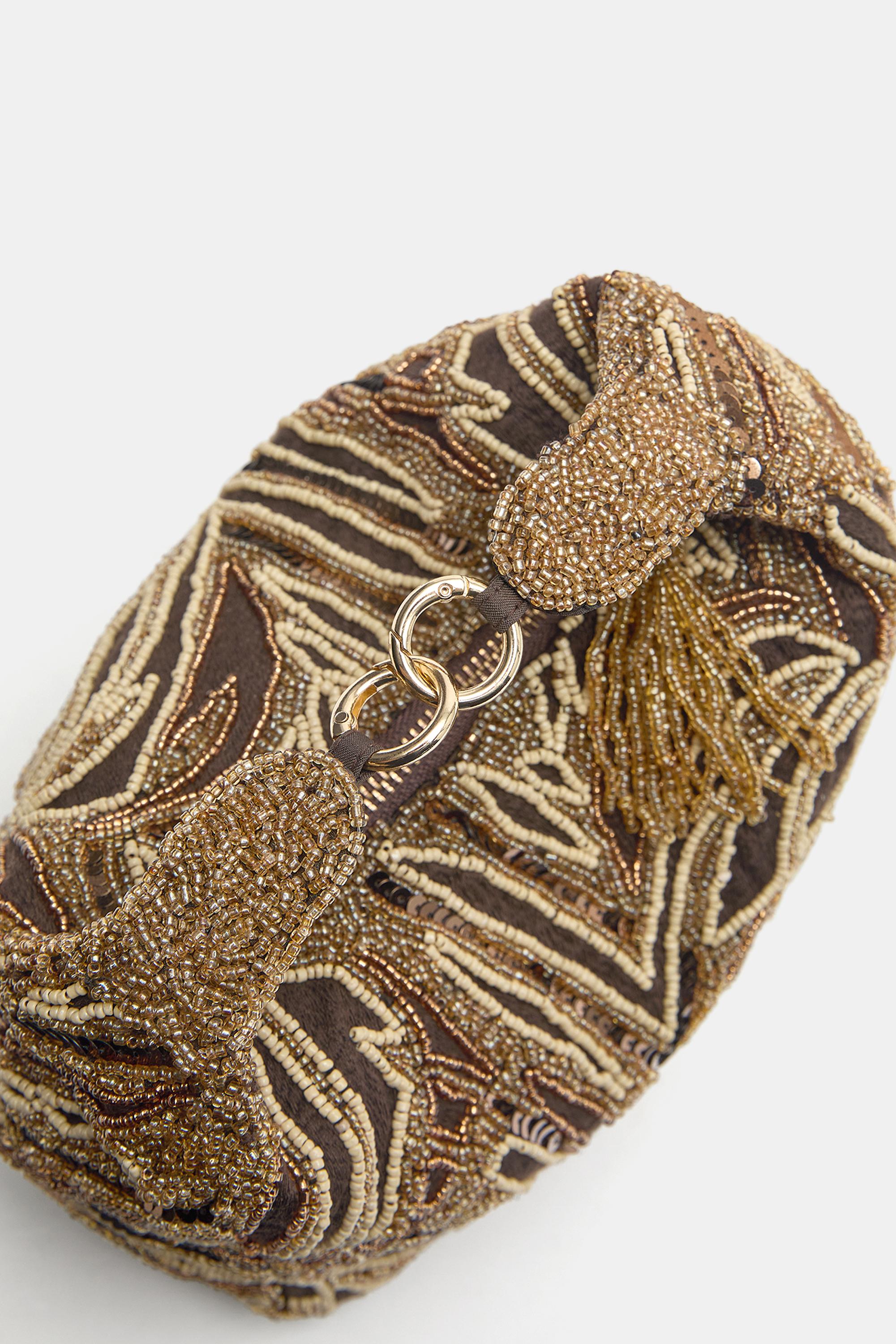 Beaded bag — Brown