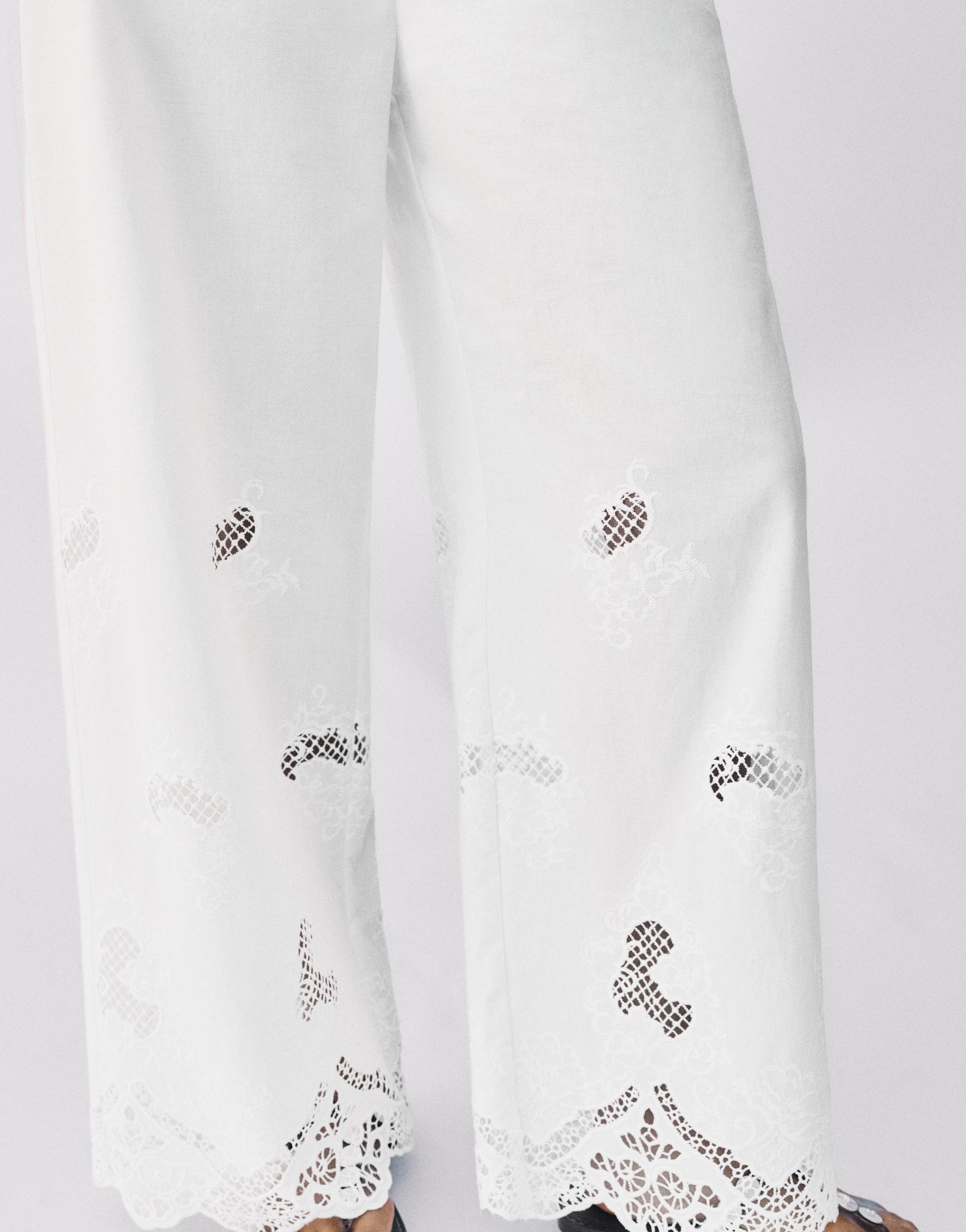 White trousers with Swiss embroidery — White