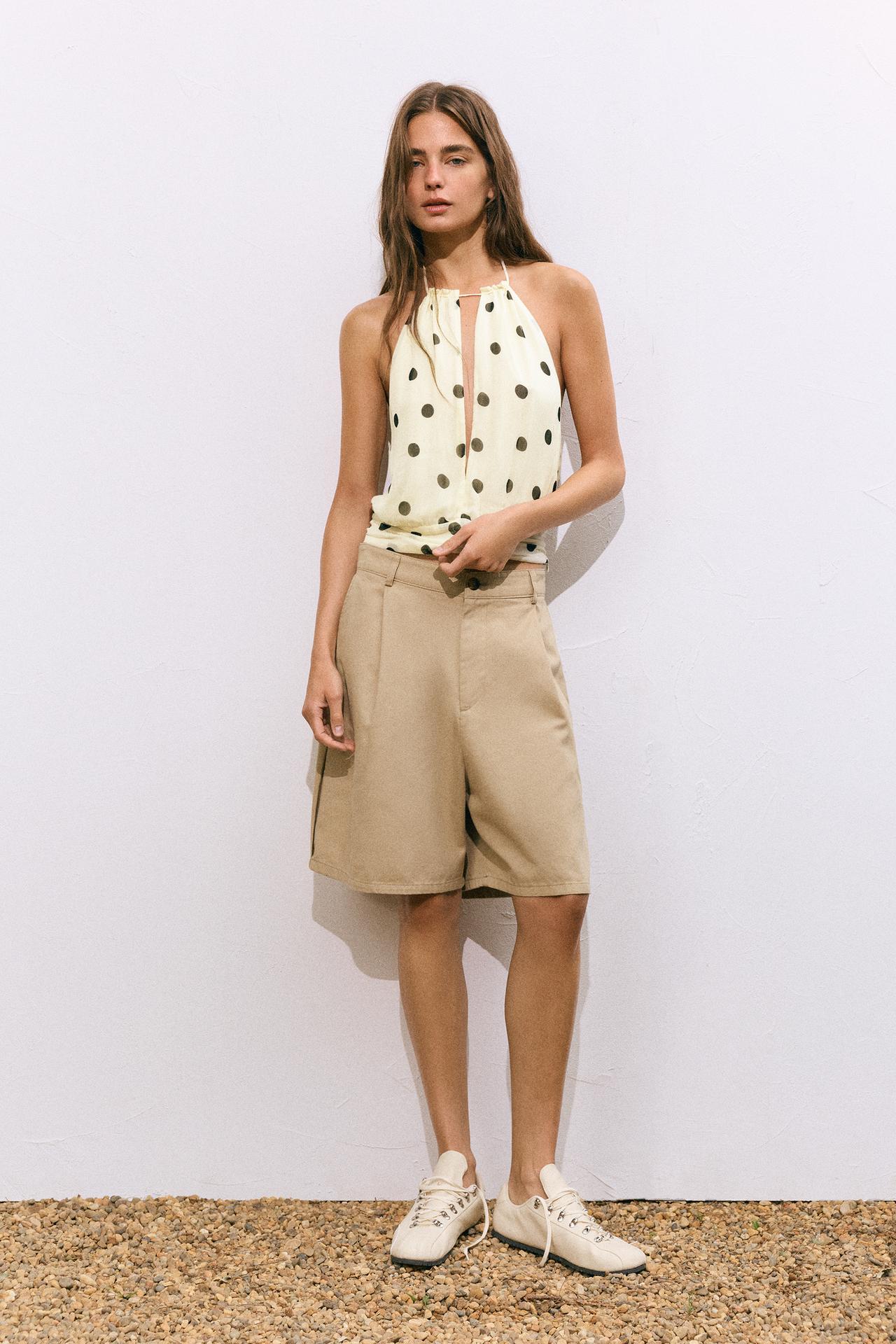 Polka dot halter top with cutout — White