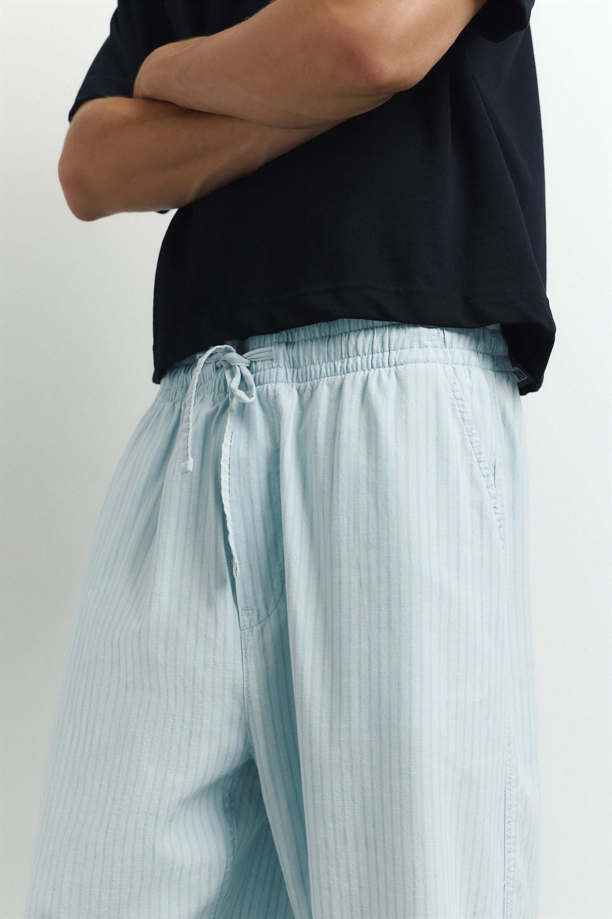 Striped pyjama-style trousers — Pale indigo