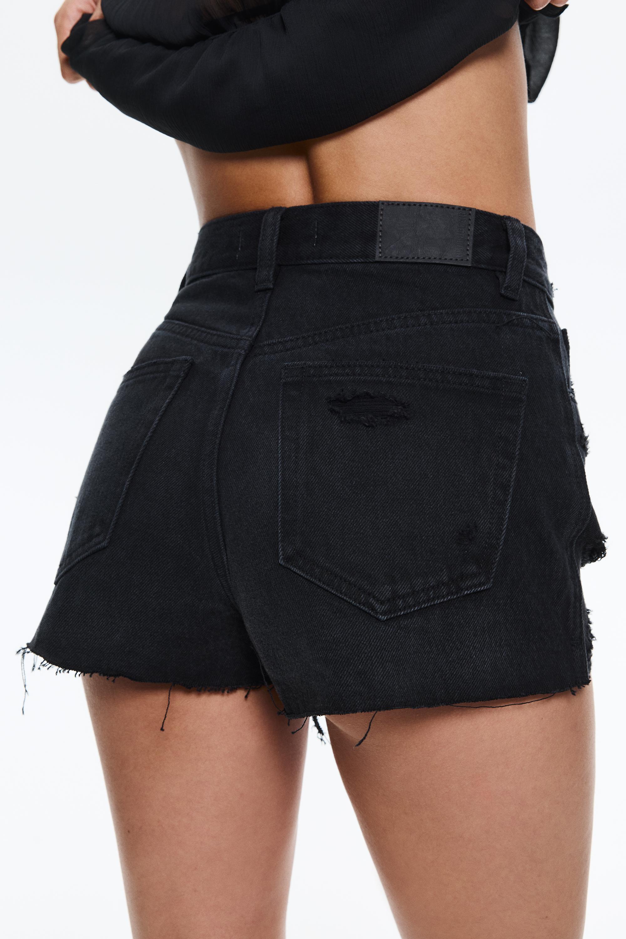 Denim shorts with frayed hems — Black