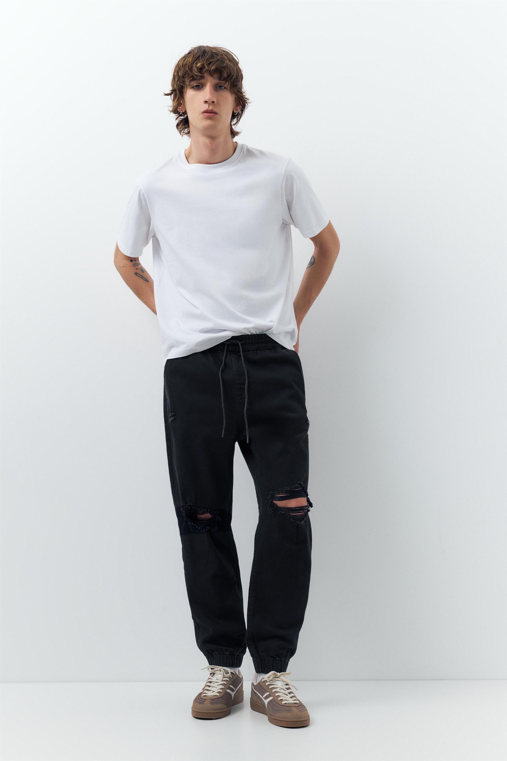 Ripped denim jogger trousers — Black