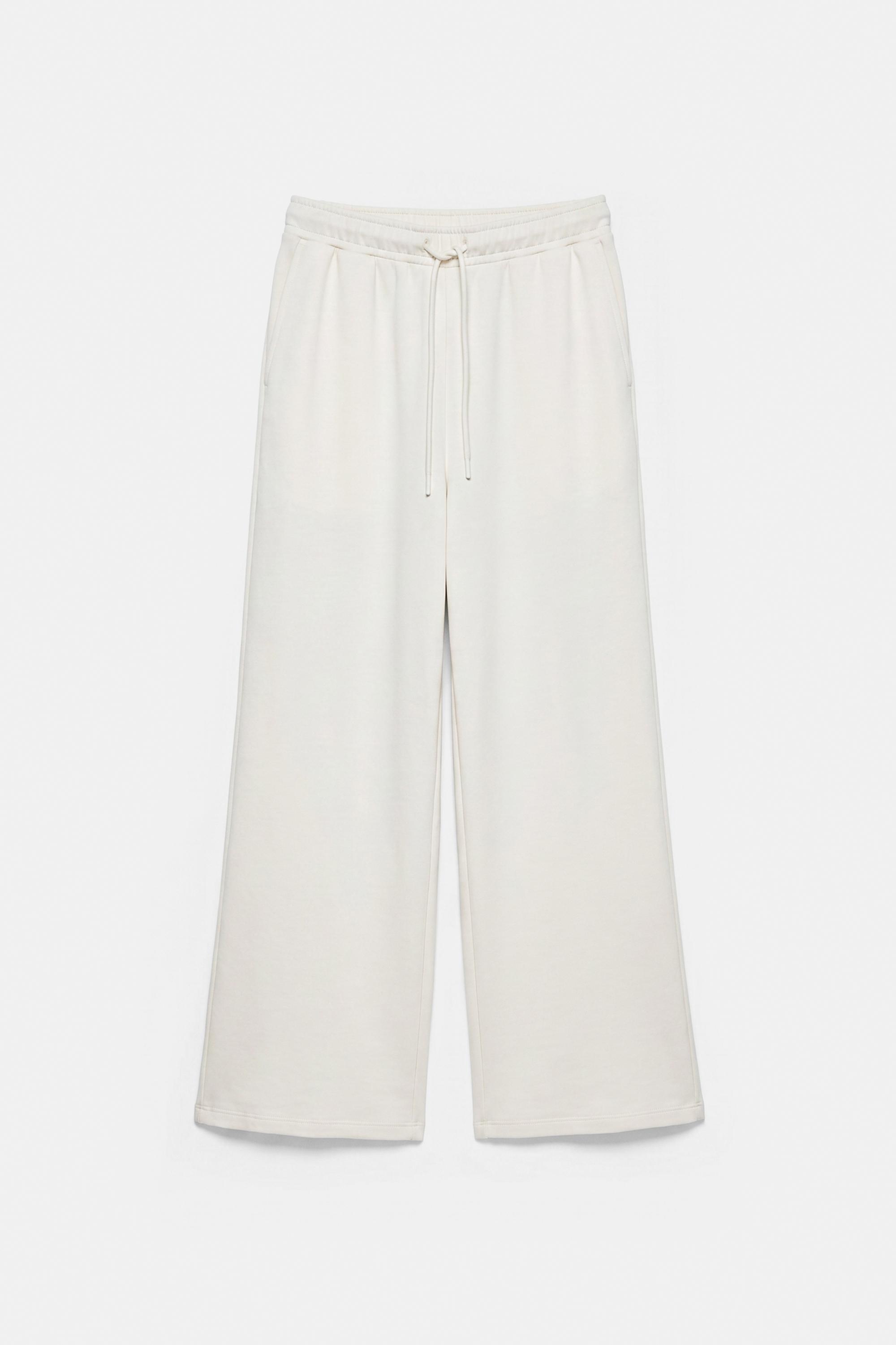 Wide-leg modal-blend trousers — Ecru
