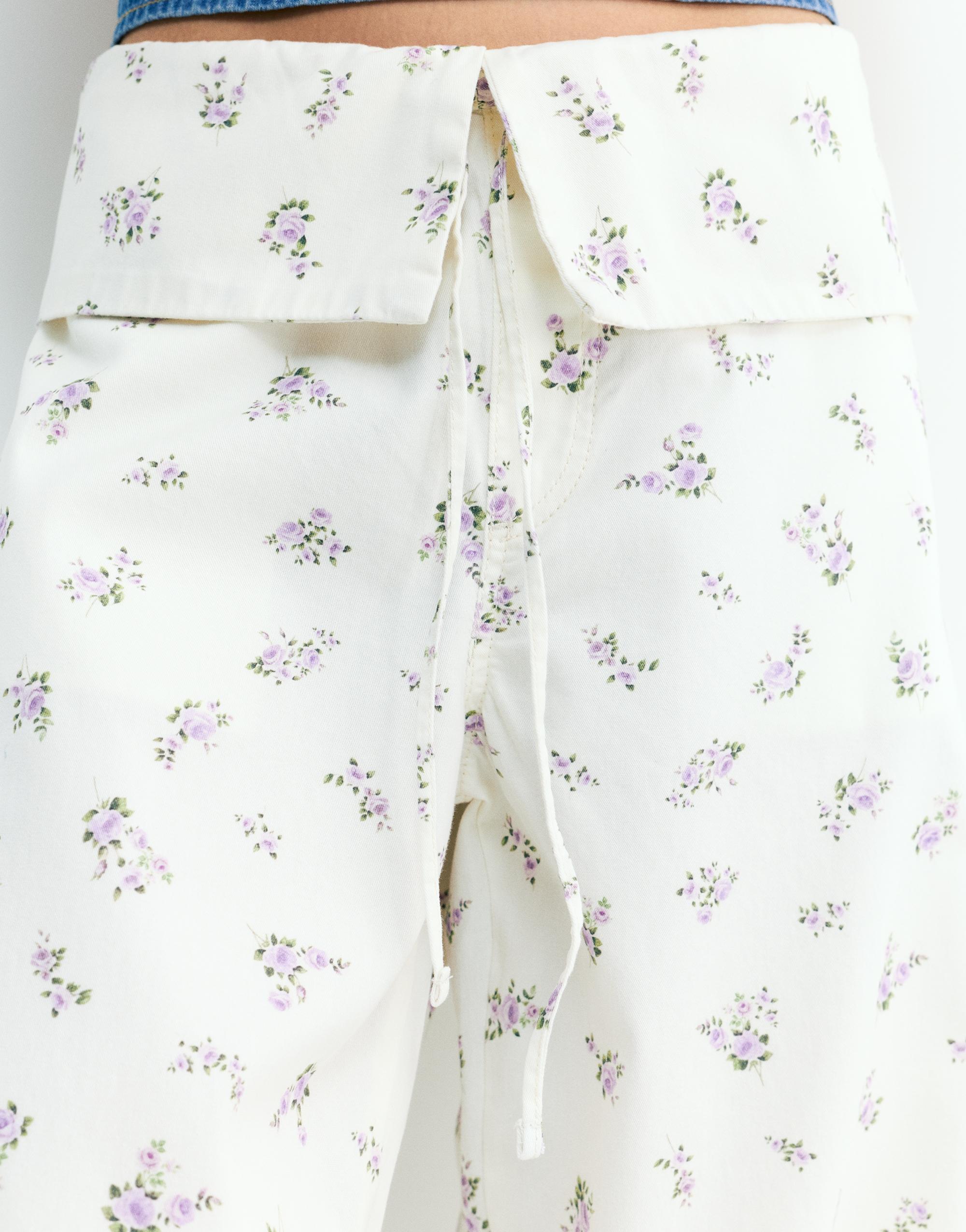 Floral trousers with turn-up waist — White