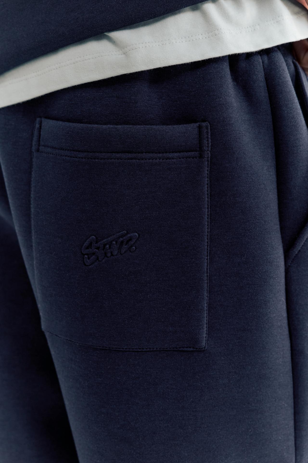 Neoprene-effect baggy trousers — Navy