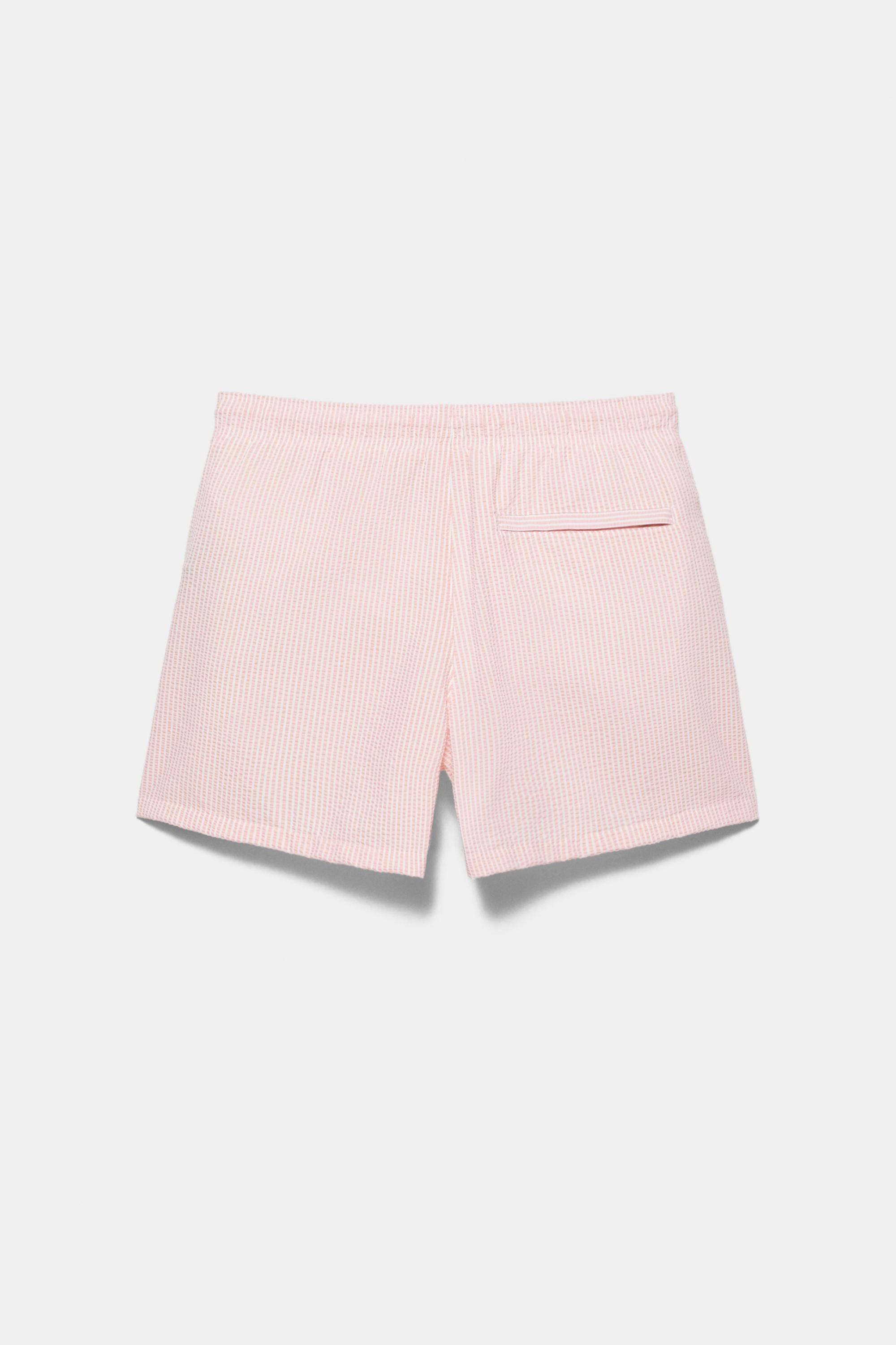 Striped seersucker swimming trunks — Pink