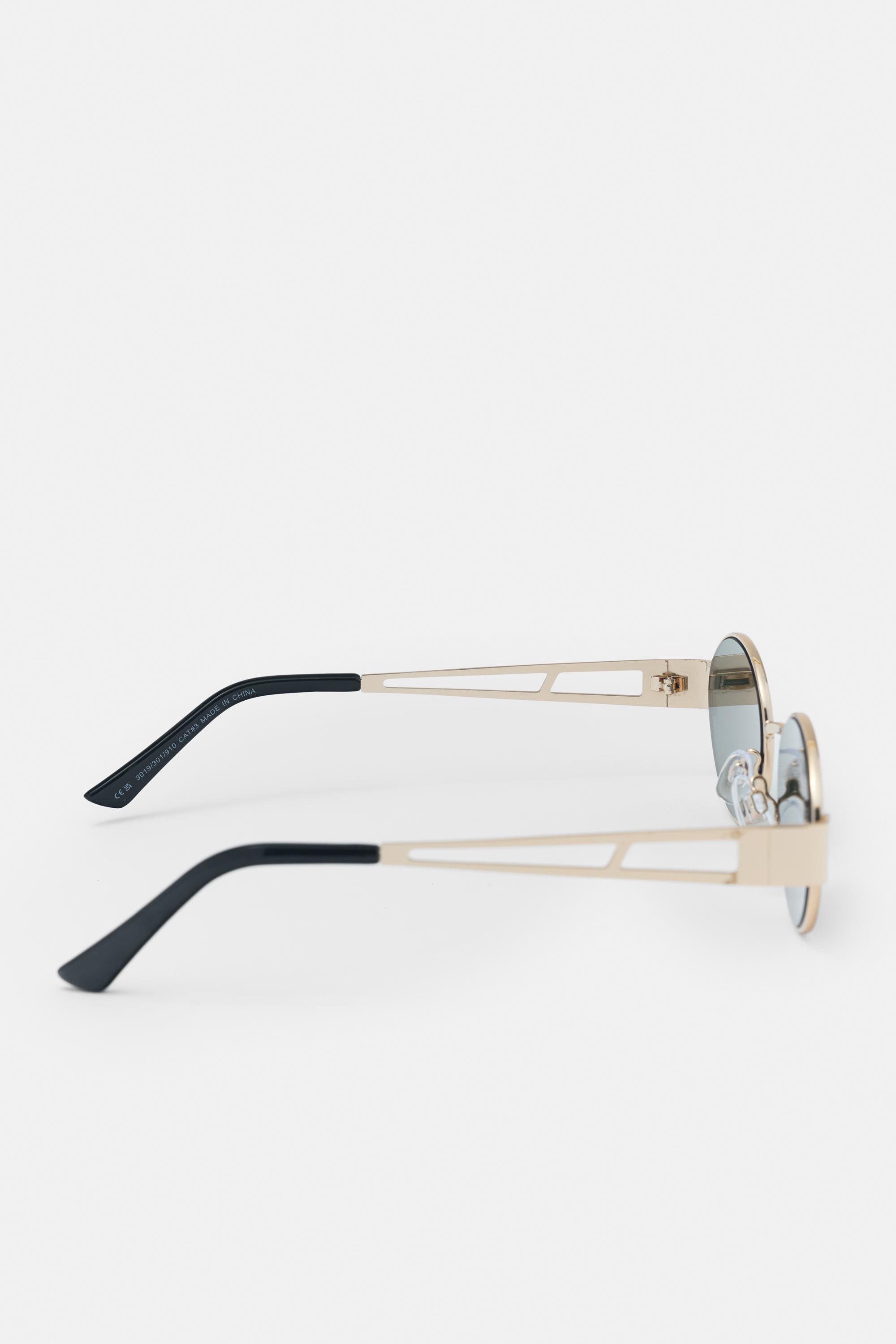 Metallic oval sunglasses — Gold