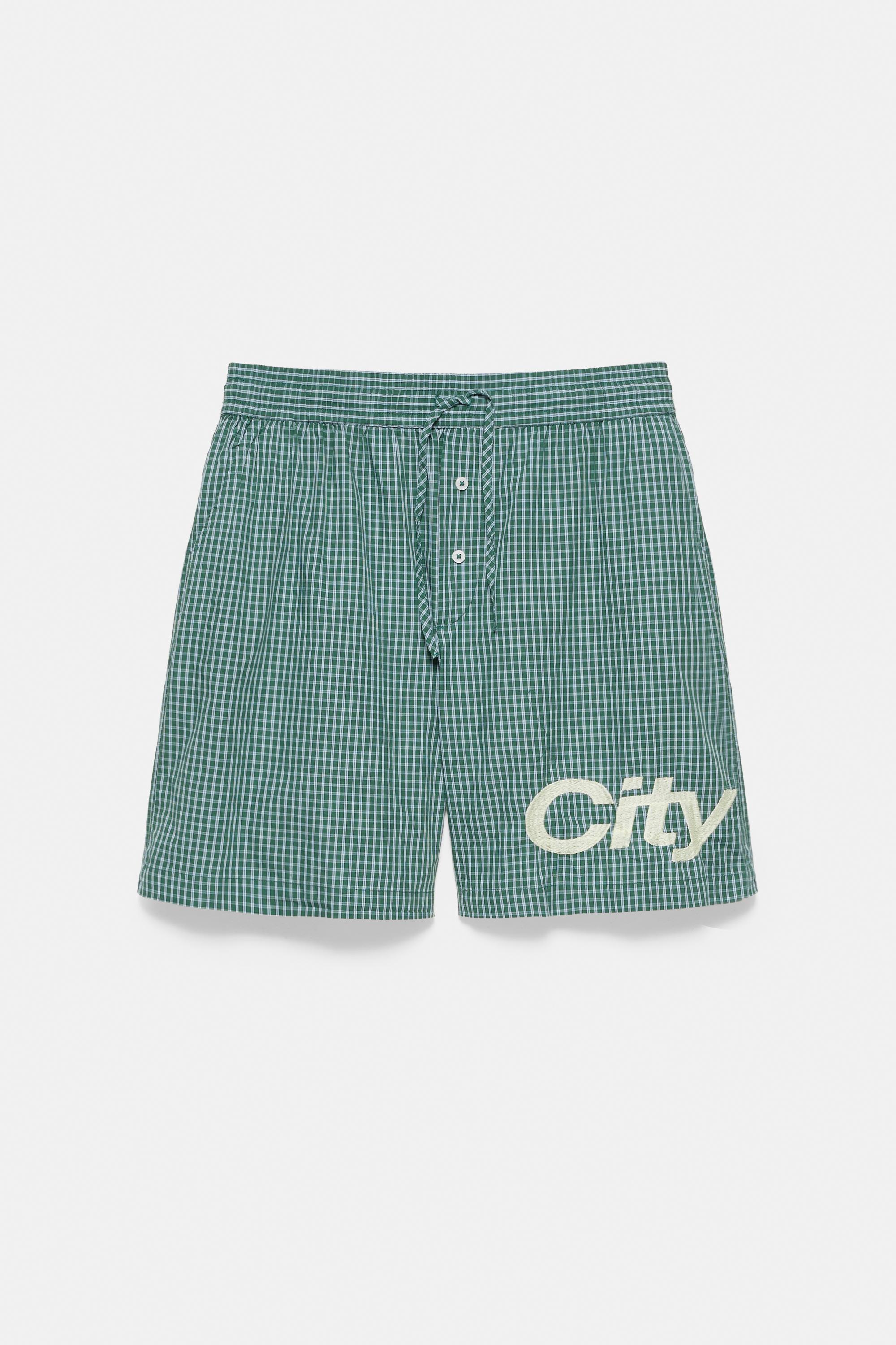 Checked graphic Bermuda shorts — Moss
