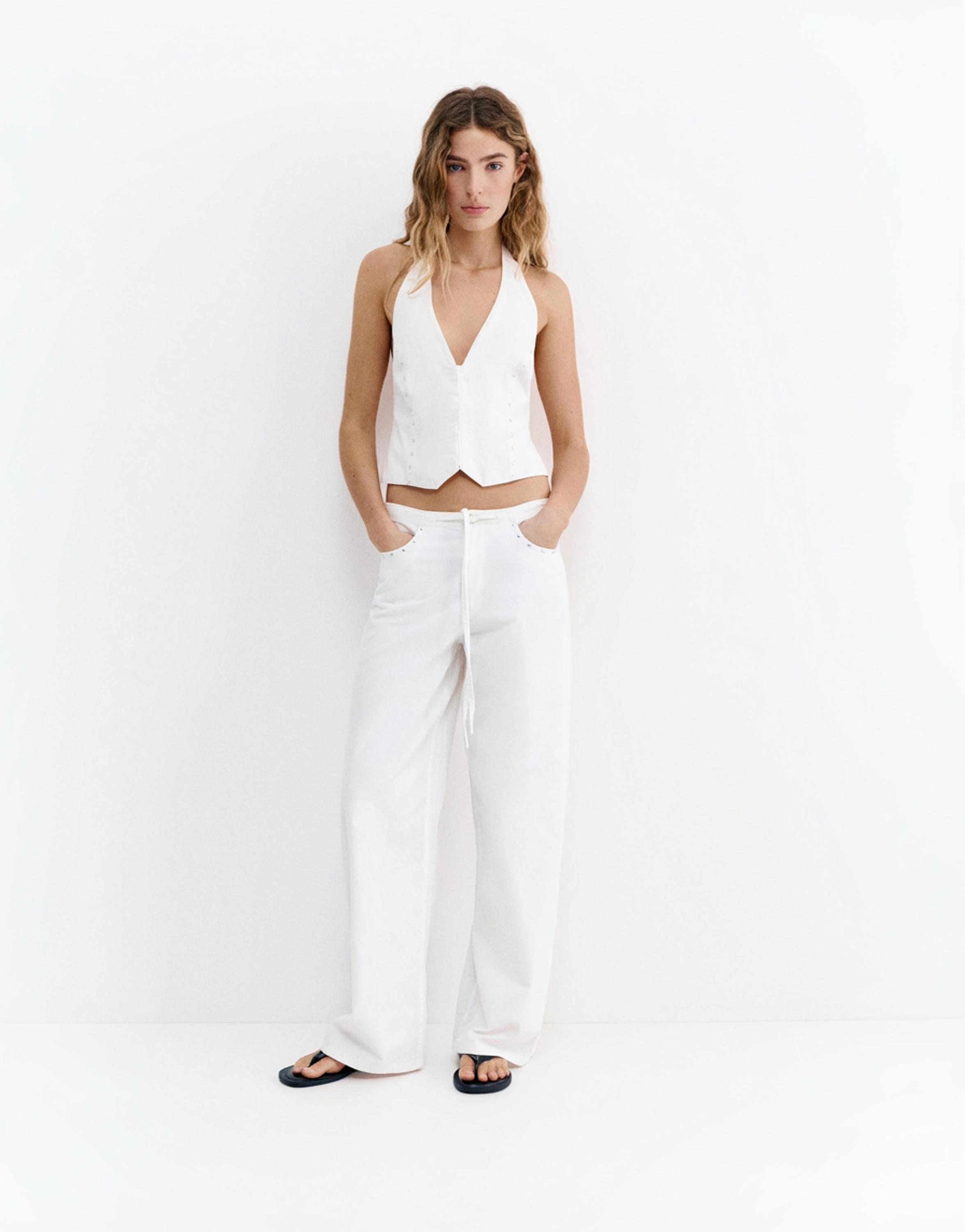 White studded baggy jeans — White