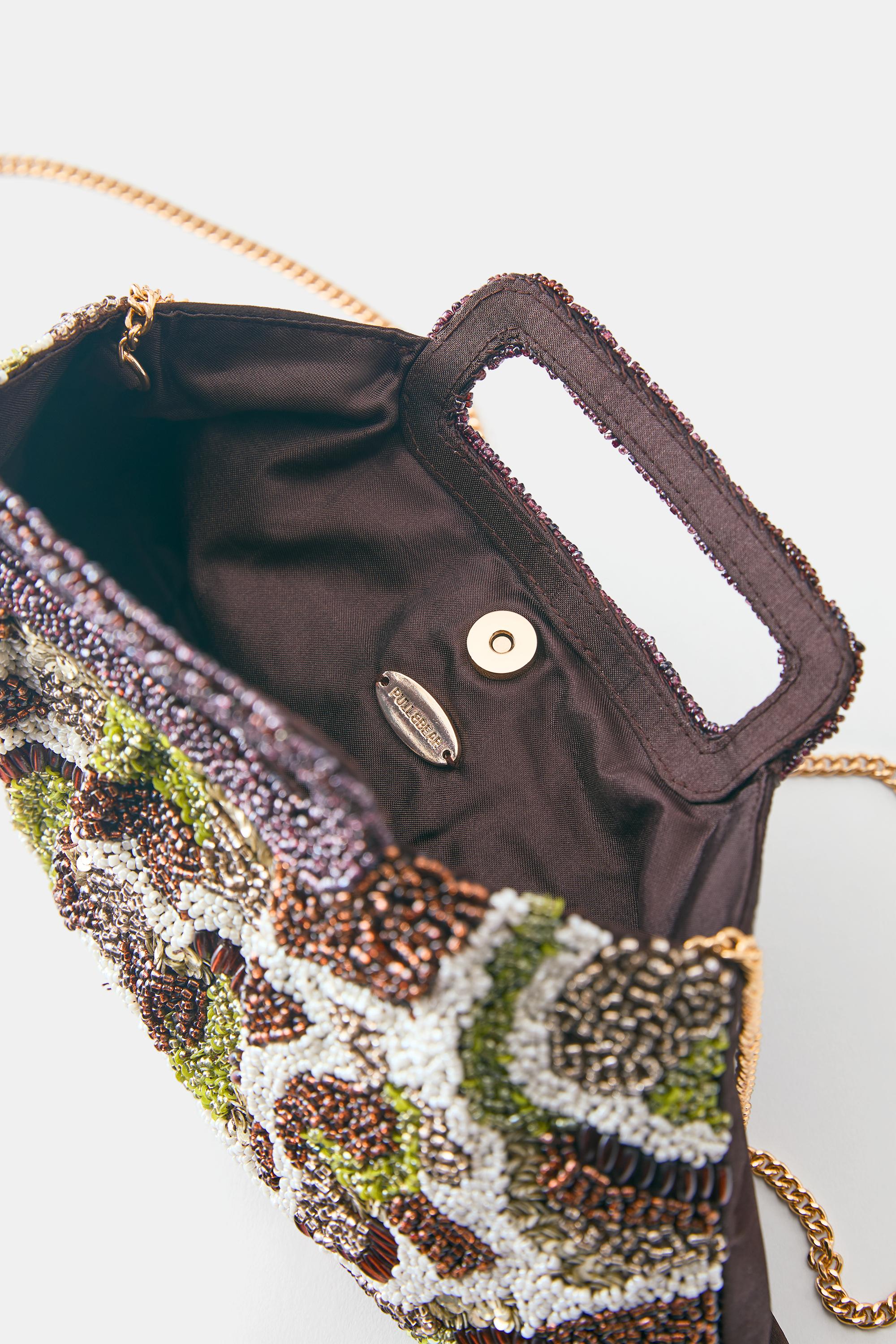 Beaded clutch bag — Brown