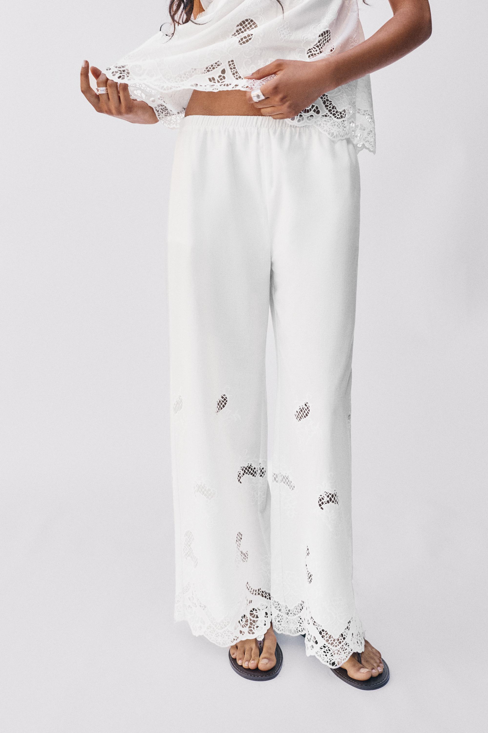 White trousers with Swiss embroidery — White