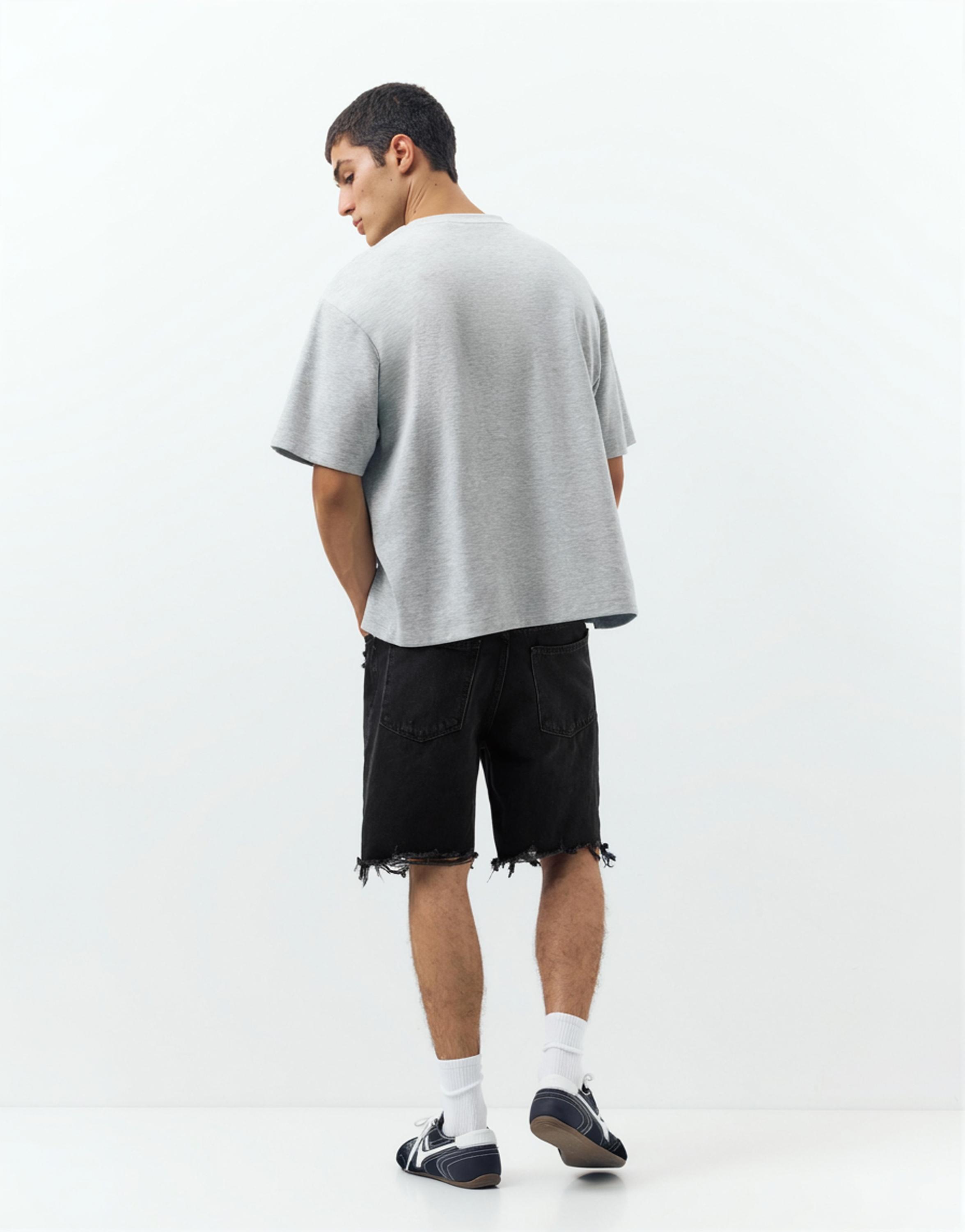 Straight-leg denim Bermuda shorts — Faded black