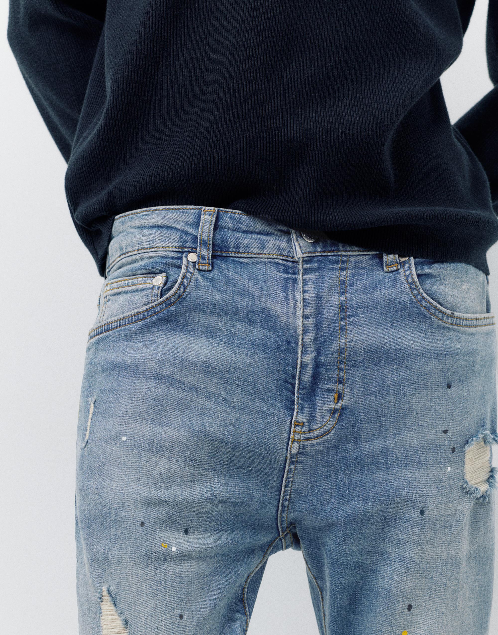 Paint splatter carrot-fit jeans — Medium blue