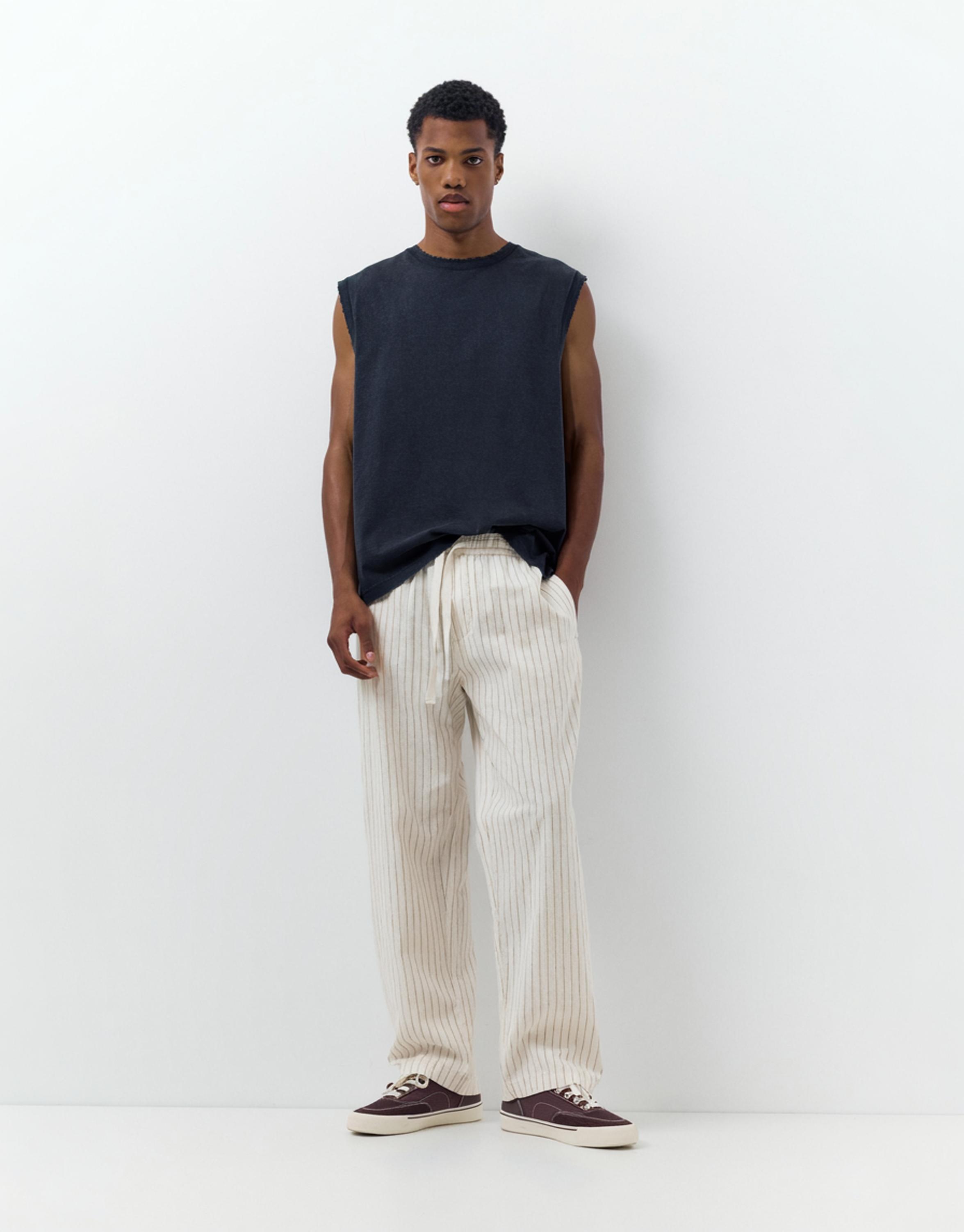 Linen blend jogger trousers — Striped