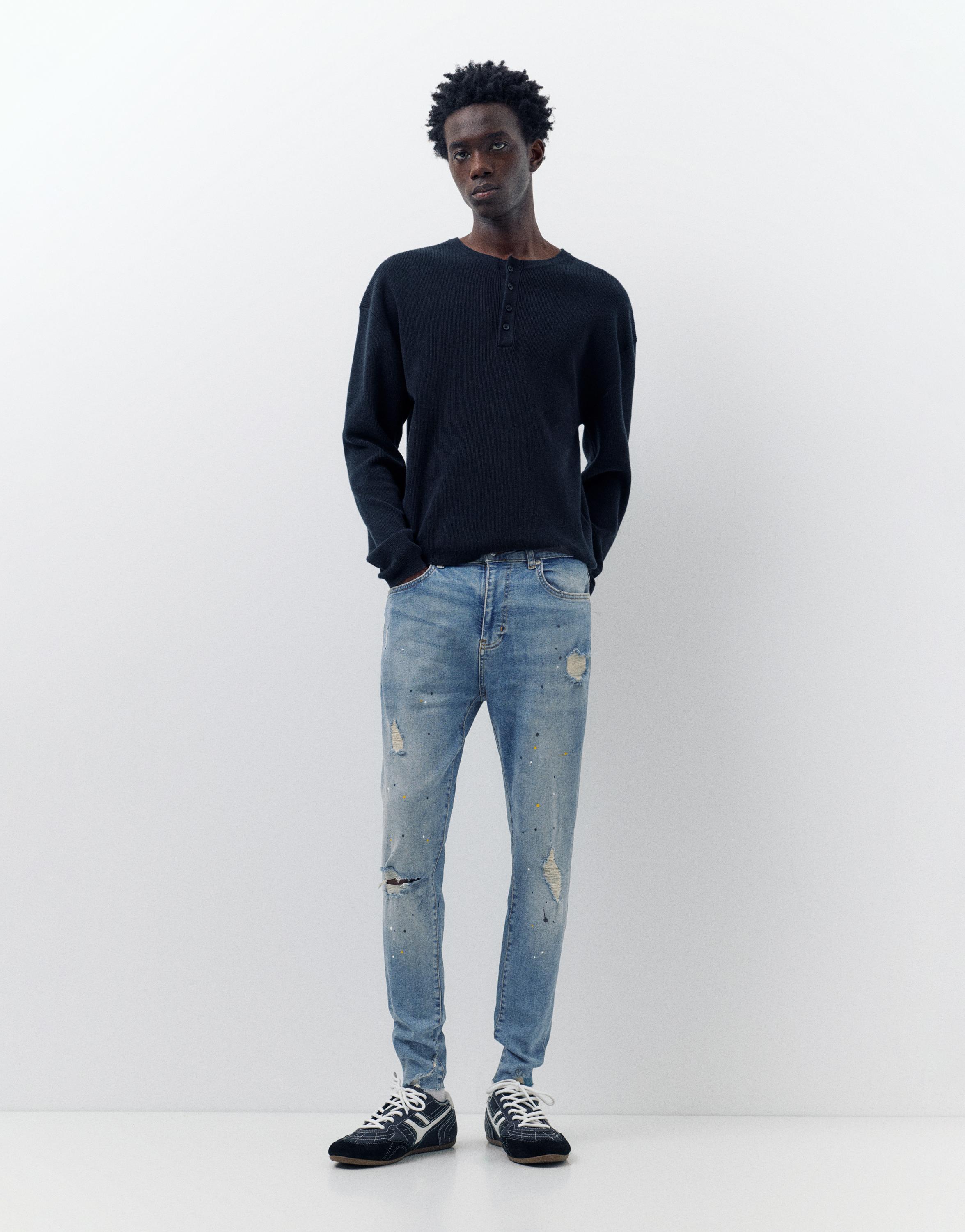 Paint splatter carrot-fit jeans — Medium blue