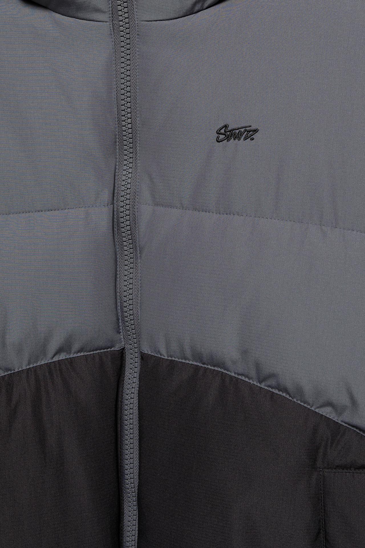 Paneled puffer jacket — Black