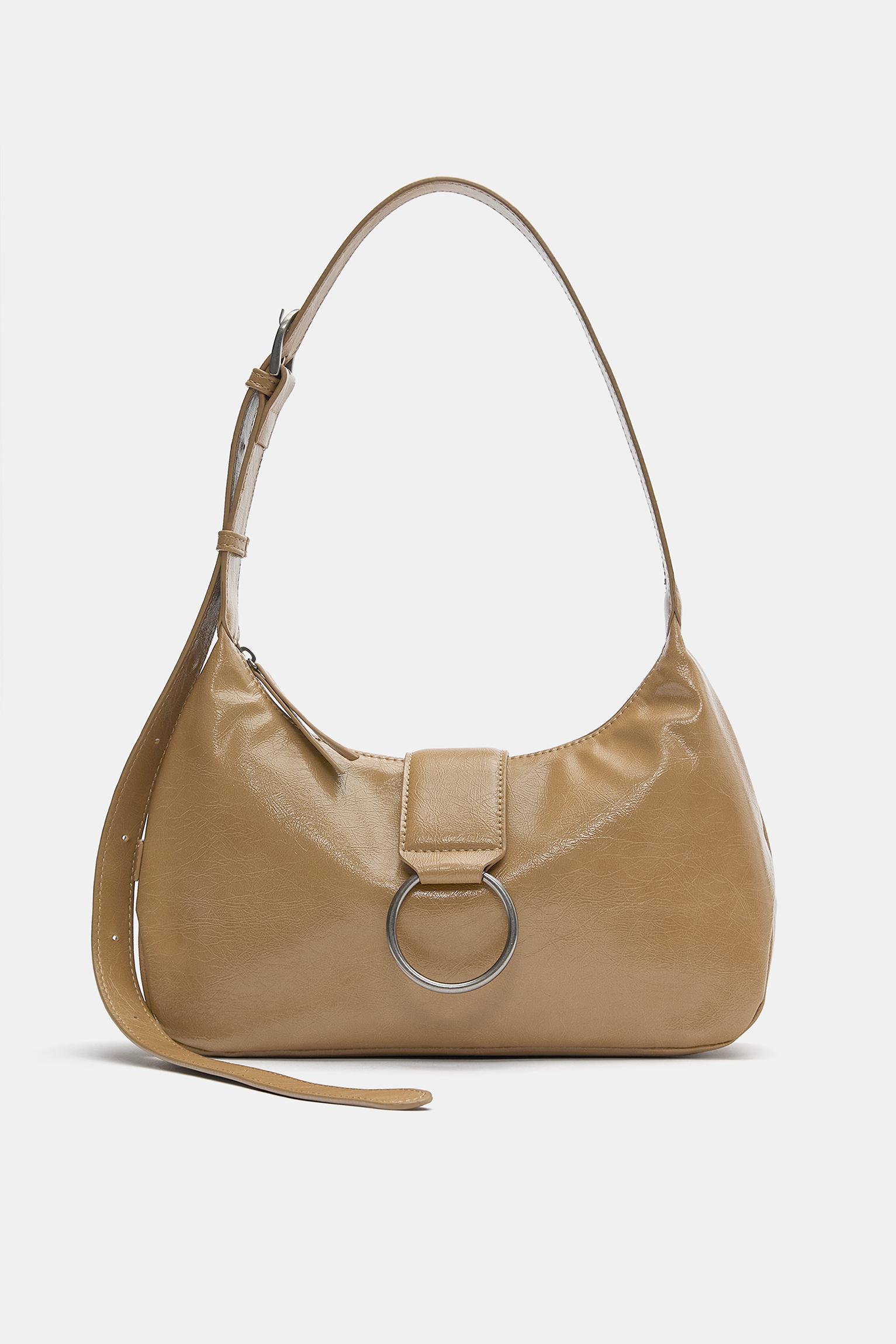 Crossbody bag with buckle — Leather