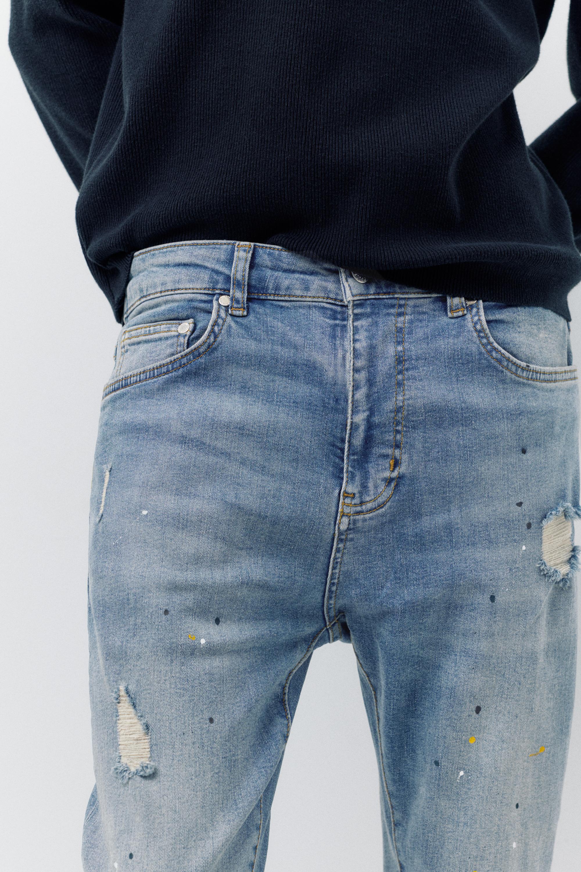 Paint splatter carrot-fit jeans — Medium blue