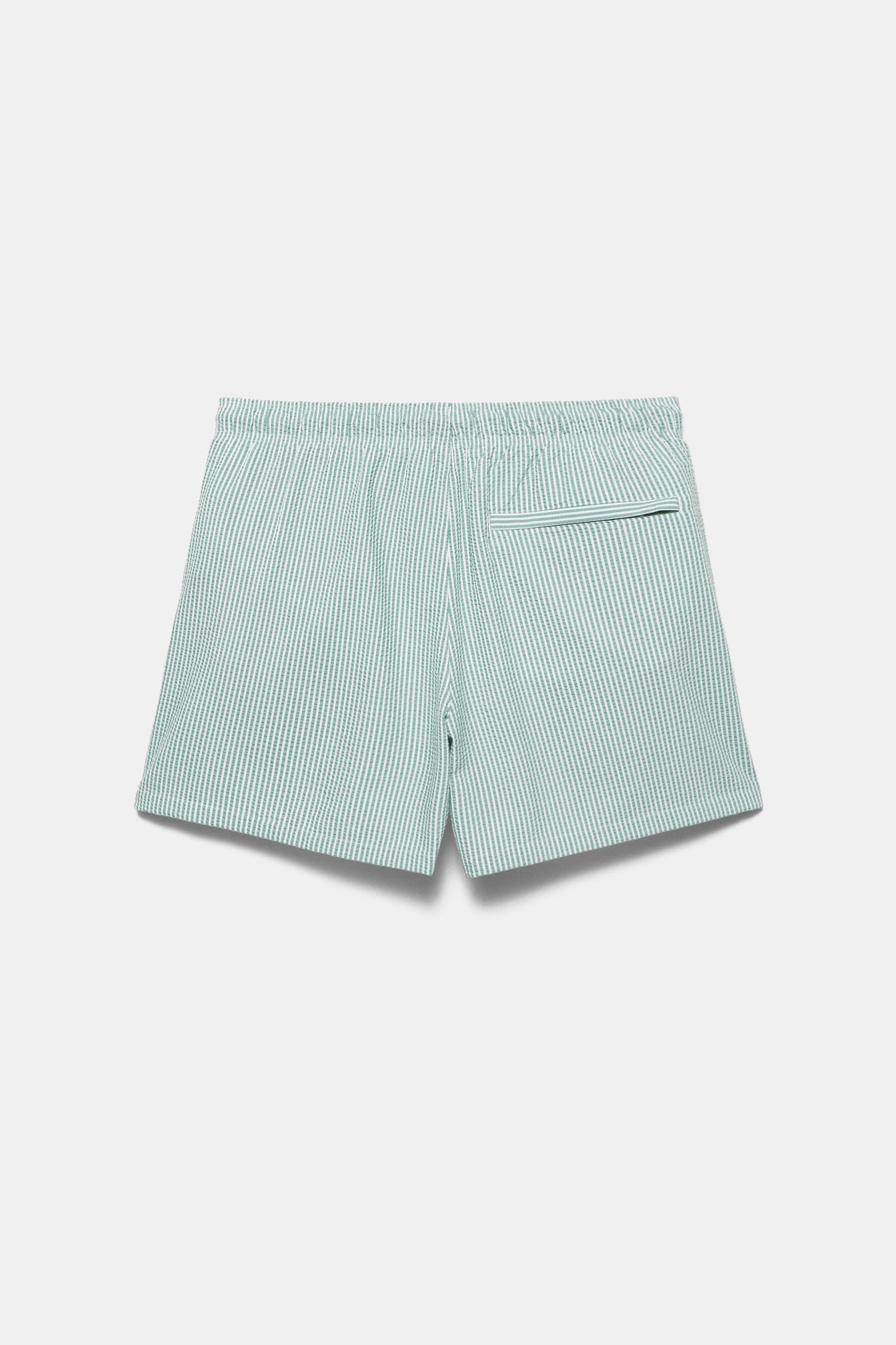 Striped seersucker swimming trunks — Green