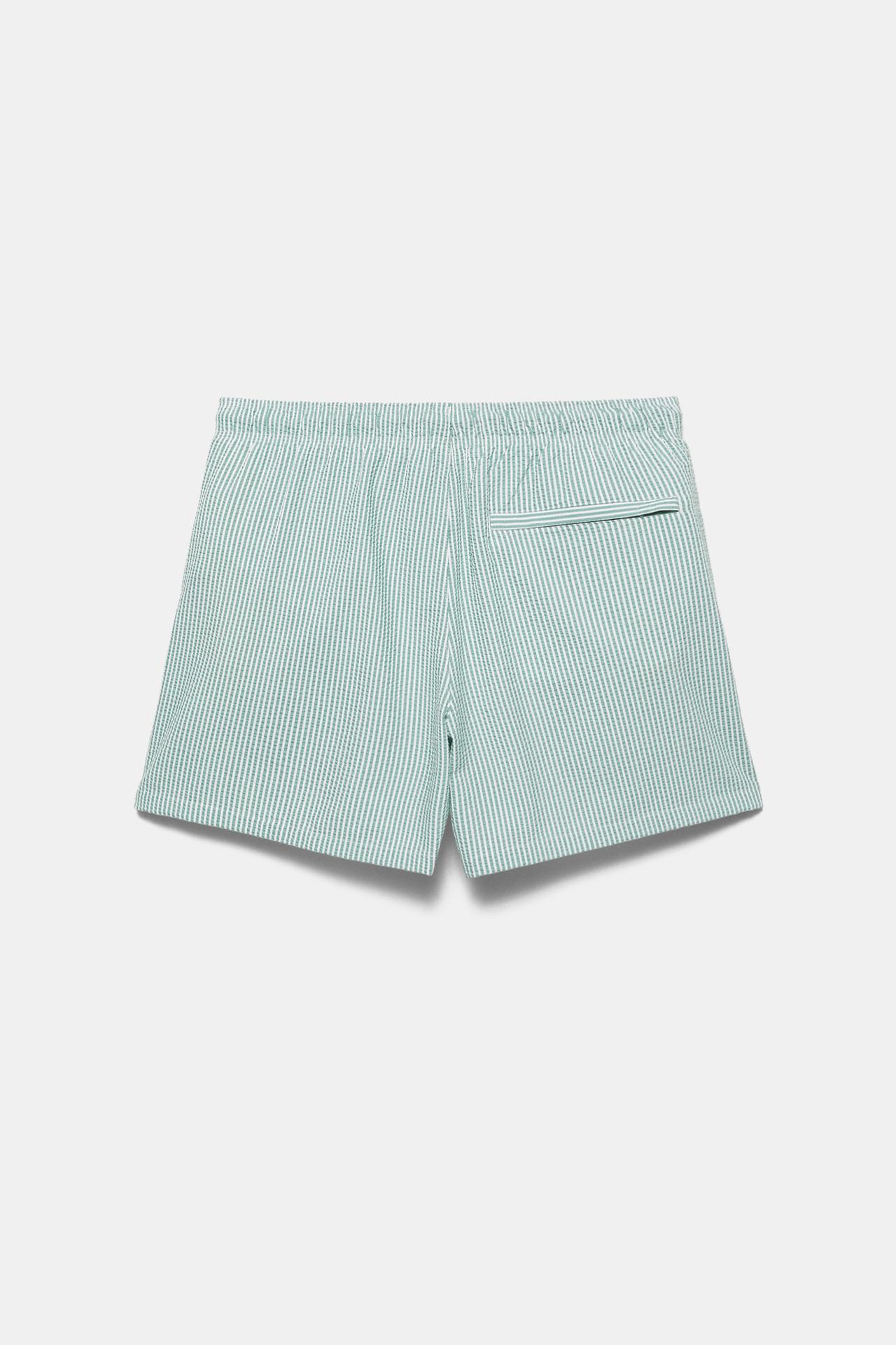 Striped seersucker swimming trunks — Green