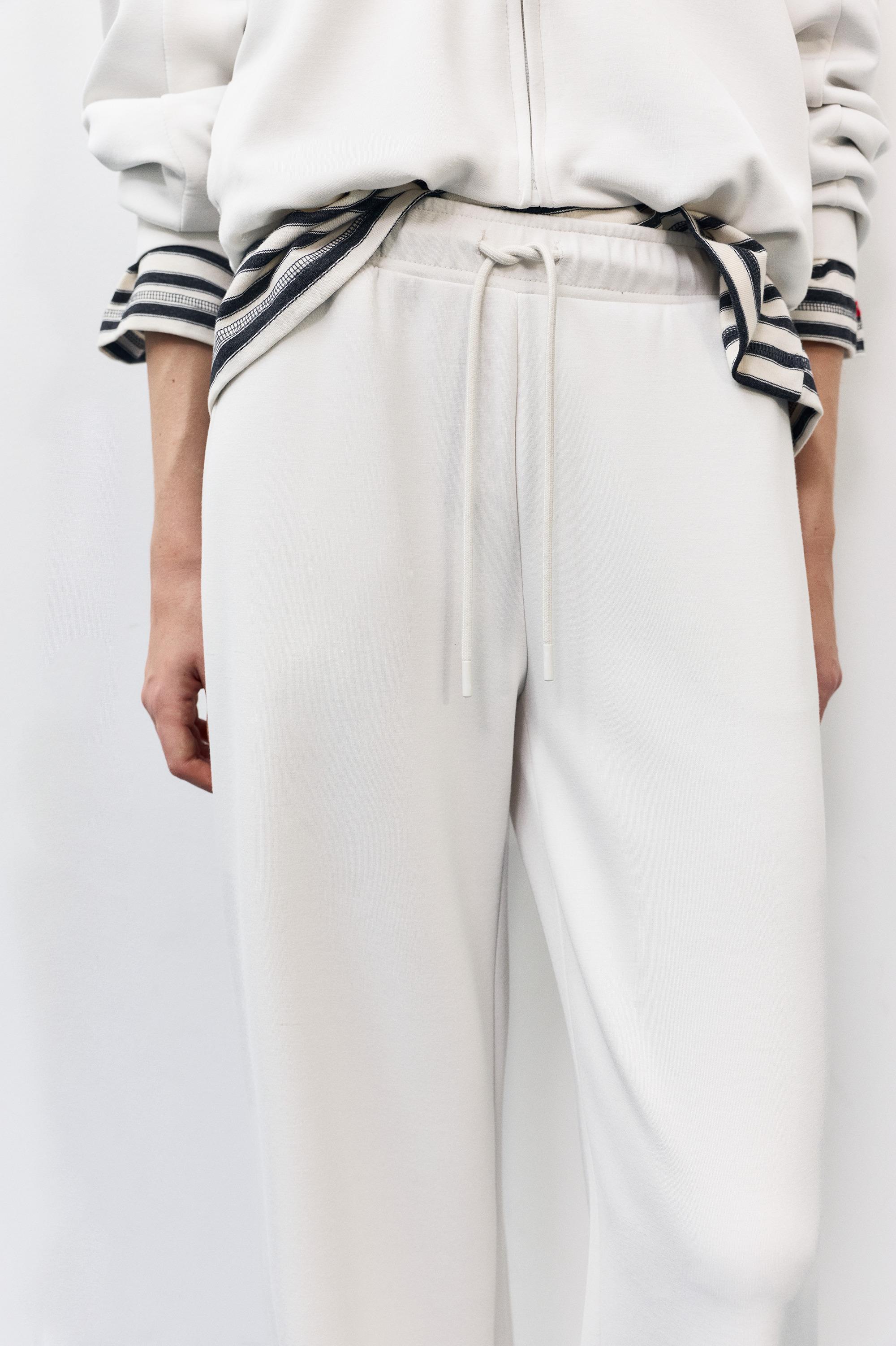 Yumuşak dokunuşlu geniş paça pantolon - Görsel 139